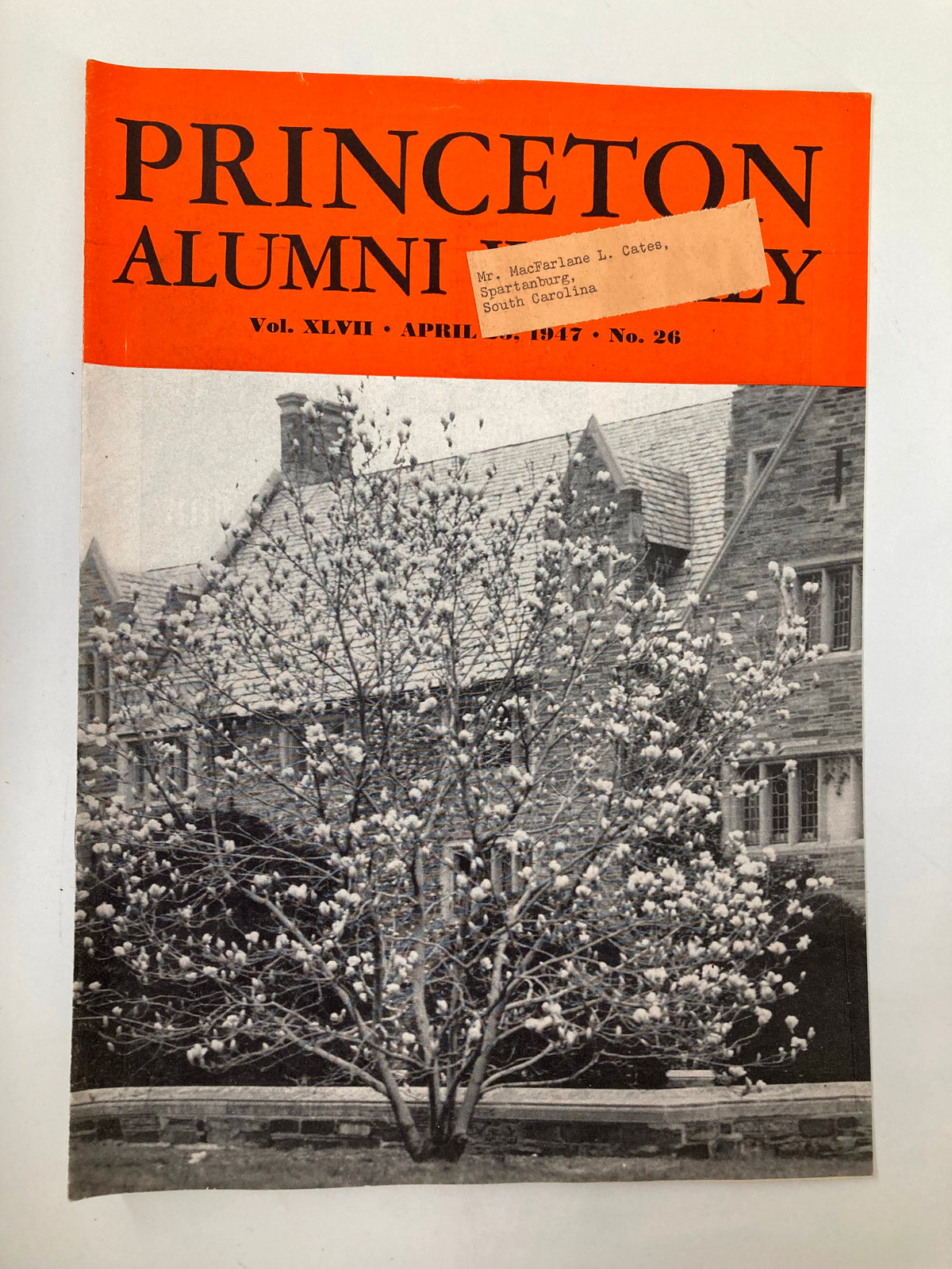 VTG Princeton Alumni Weekly April 25 1947 cover featuring a vintage photograph of a blossoming tree in front of Princeton University architecture, showcasing its historical significance.
