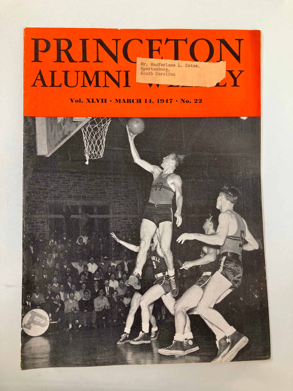 Cover of VTG Princeton Alumni Weekly March 14 1947 featuring a basketball game, showcasing Princeton alumni during a sports event.