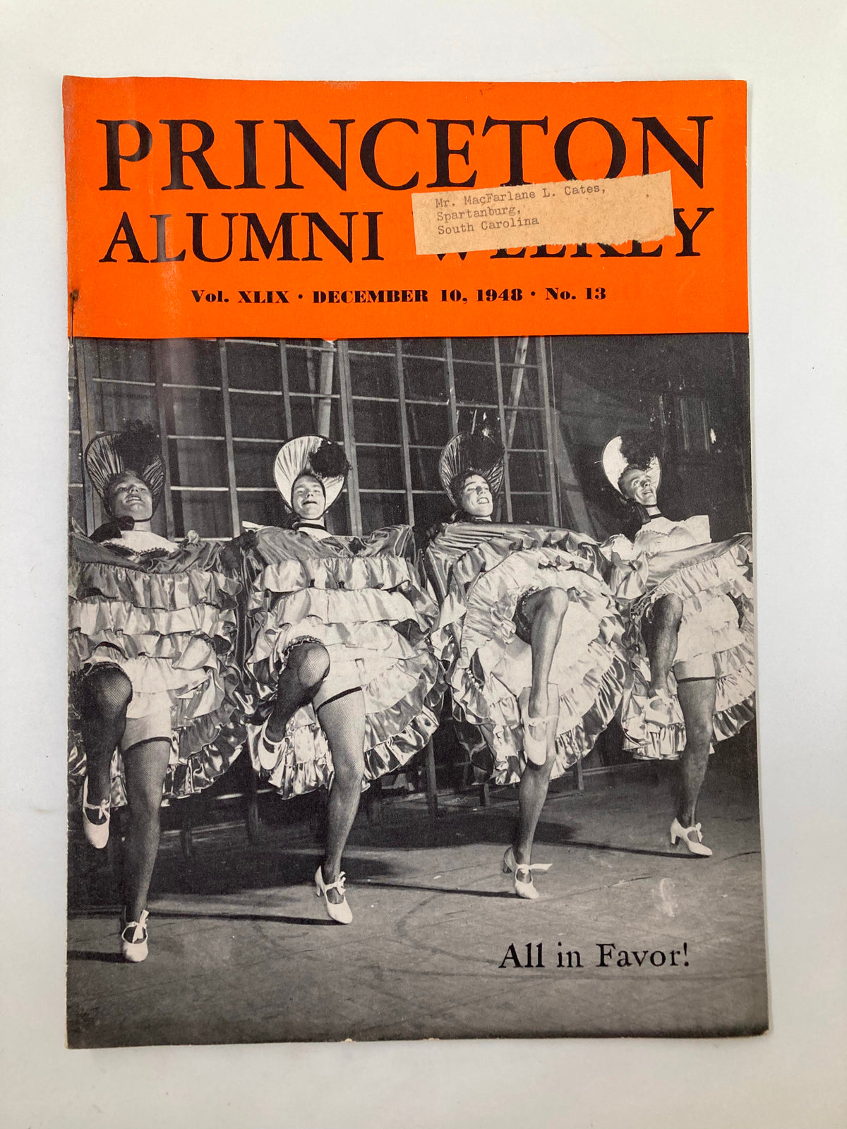 VTG Princeton Alumni Weekly December 10, 1948 cover featuring performers from 'The All in Favor', showcasing vintage theatrical attire with vibrant costumes and choreography.