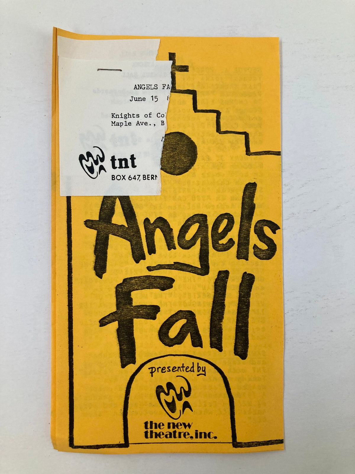 Front cover of the 1982 Souvenir Program 'Angels Fall' by Jerry Marino presented by The New Theatre Inc., featuring a bright yellow design with black lettering.