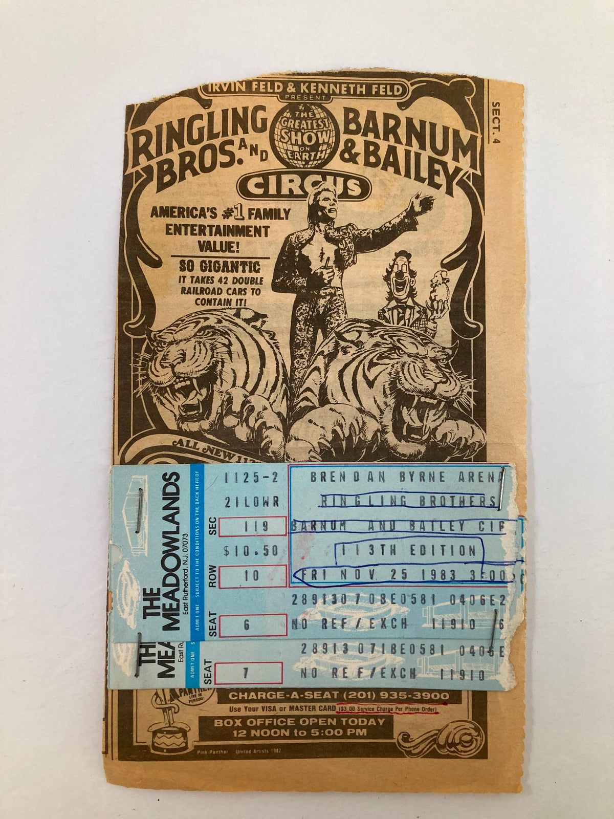 1983 Souvenir Program from Brendan Byrne Arena featuring Ringling Bros. and Barnum & Bailey, showcasing circus entertainment memorabilia with ticket stapled on the front.