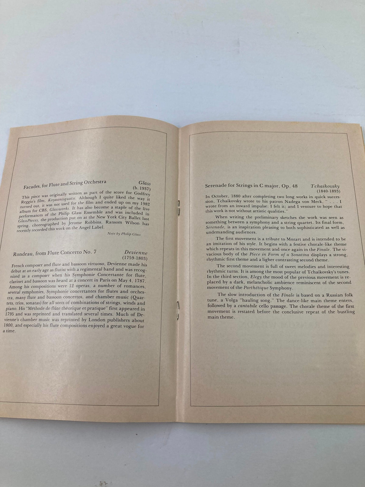 Continuation of the concert program from the 1984 Program for the Community Concert Association, detailing musical pieces like 'Rondeau, for Flute Concerto No. 7' by François Devienne, and 'Serenade for Strings in C major, Op. 48' by Tchaikovsky.