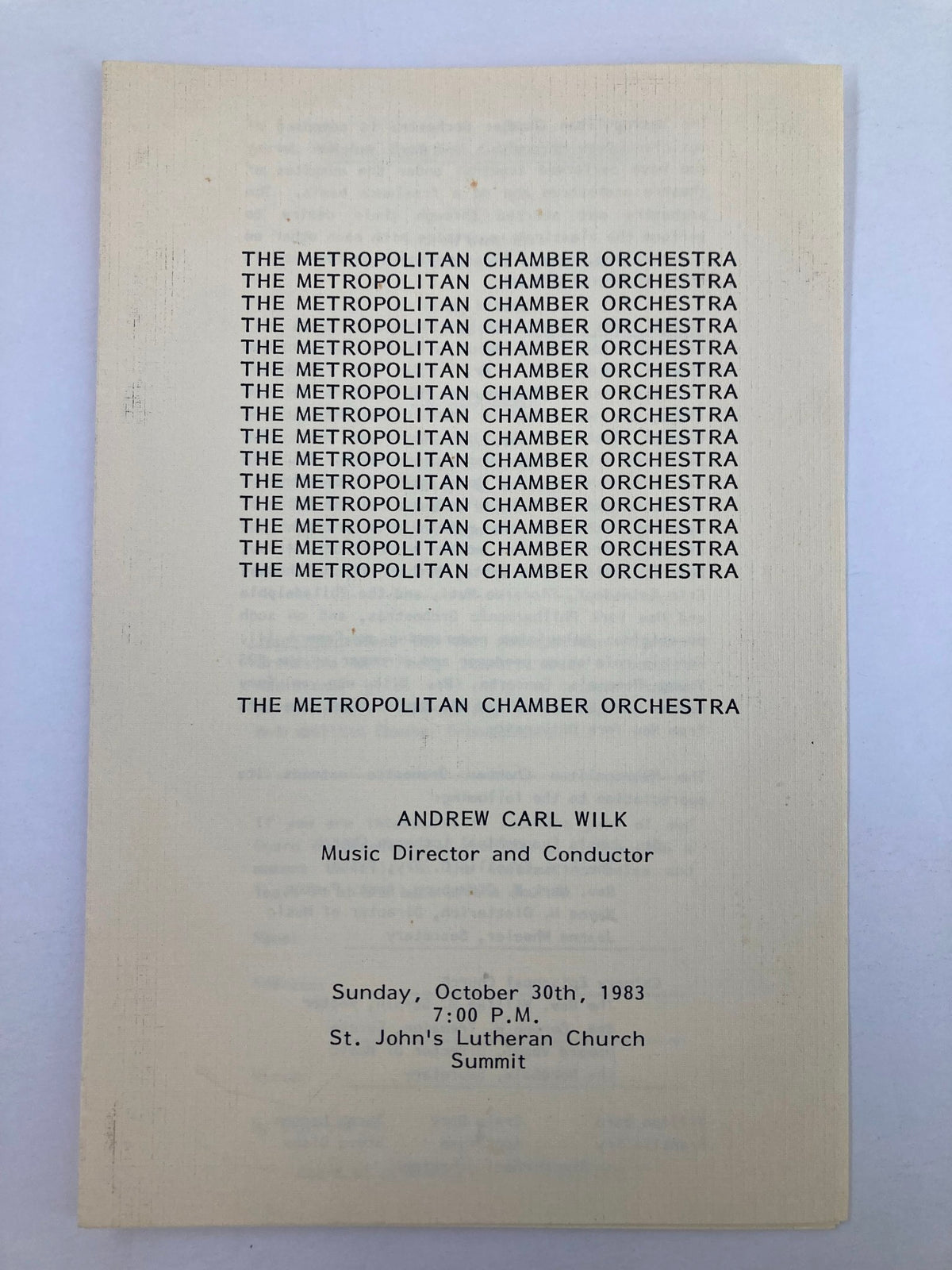 Cover page of the 1983 program for The Metropolitan Chamber Orchestra, conducted by Andrew Carl Wilk, featuring repeated text of the orchestra name.