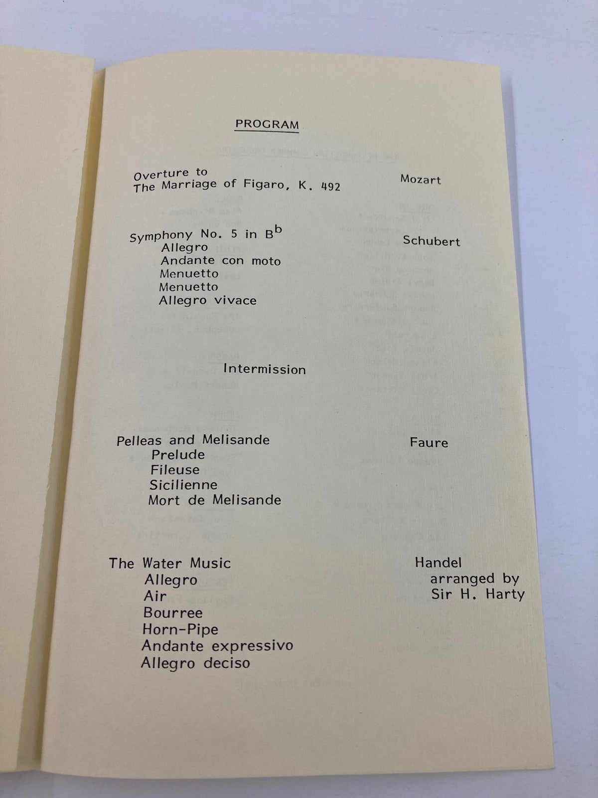 Third page of the 1983 program for The Metropolitan Chamber Orchestra, listing the musical pieces including Mozart's Overture to The Marriage of Figaro and Schubert's Symphony No. 5.