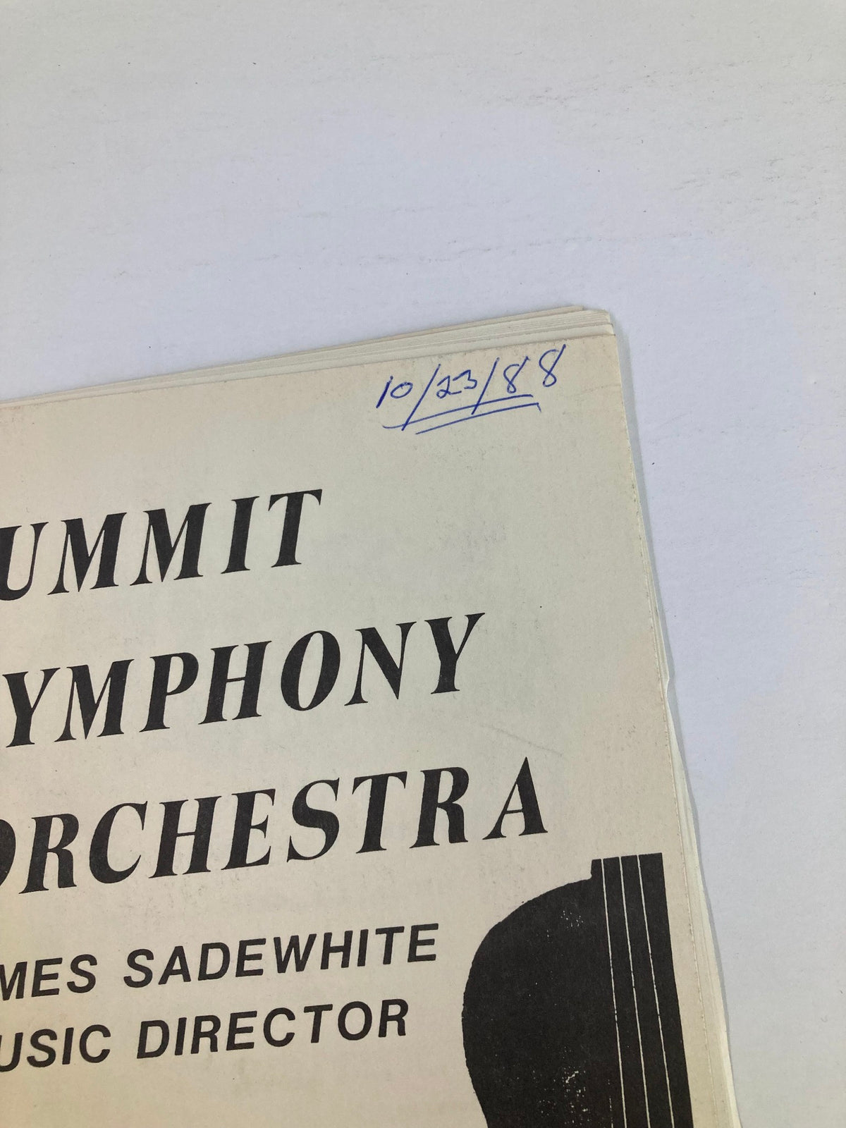 Close-up image of the top corner of the 1988 Summit Symphony Orchestra Program, showing the date 10/23/88 and the name of the music director, James Sadewhite.