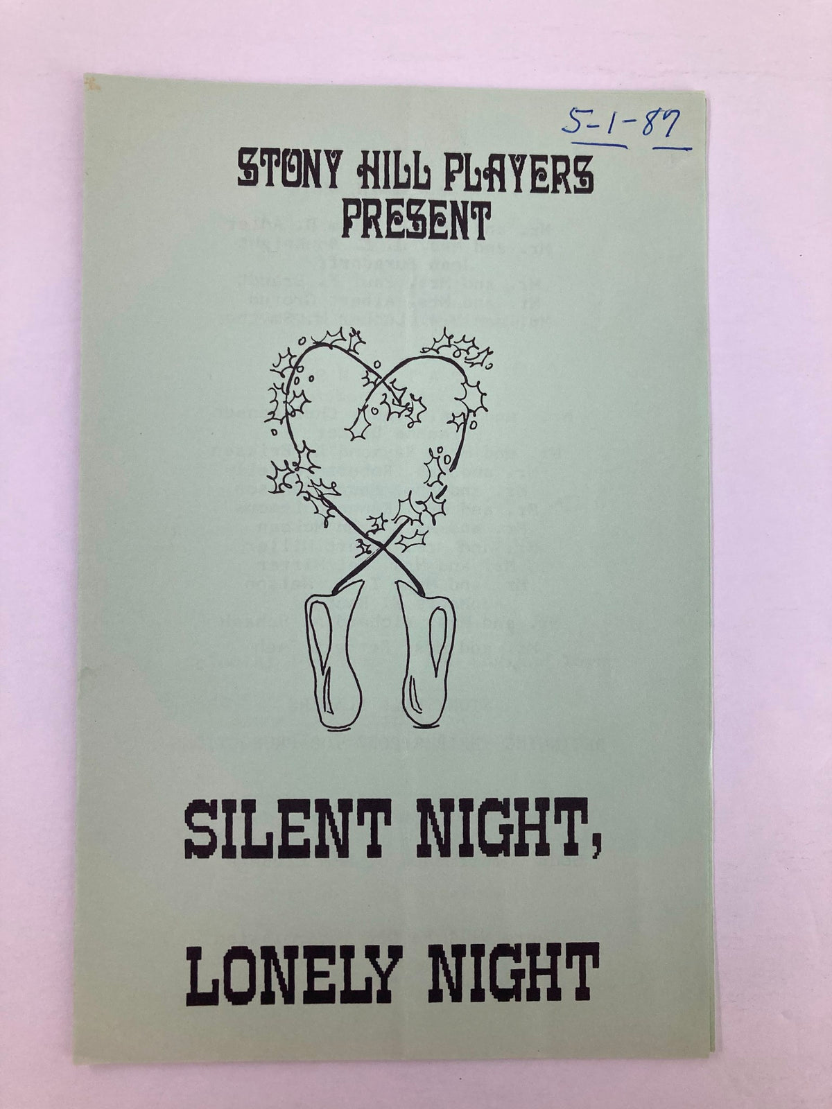 Cover of the 1987 program for Stony Hill Players presenting 'Silent Night, Lonely Night', featuring artistic heart and star designs.