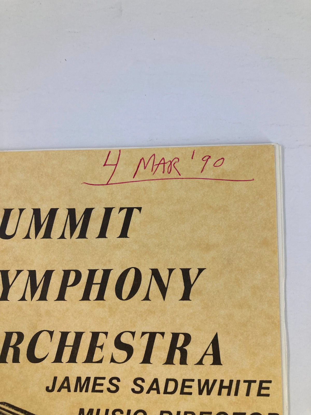 Close-up of the front cover of the 1990 Program The Summit Symphony Orchestra, highlighting the date '4 MAR '90' written in red.