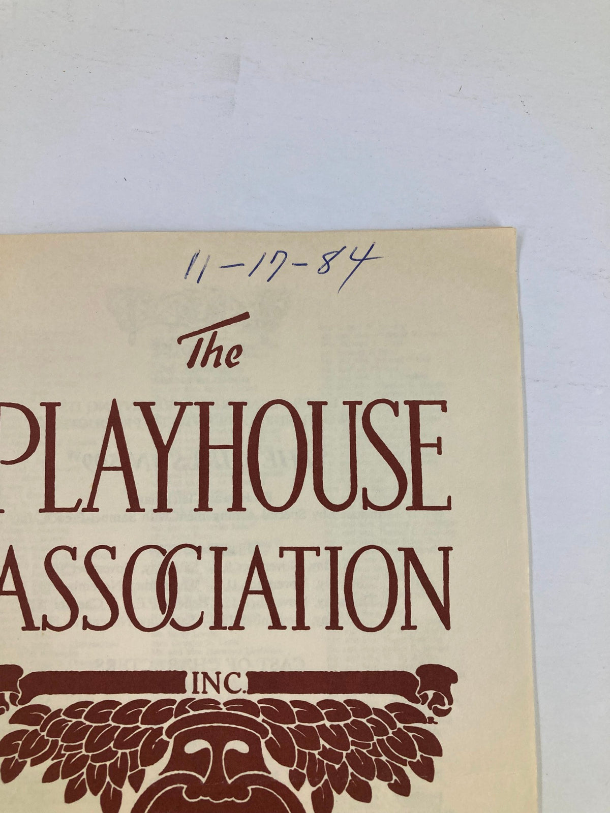 Close-up of the cover of the 1984 program for The Girls in 509 by Howard Teichmann, showing the title and logo of The Playhouse Association, with a handwritten date on top.