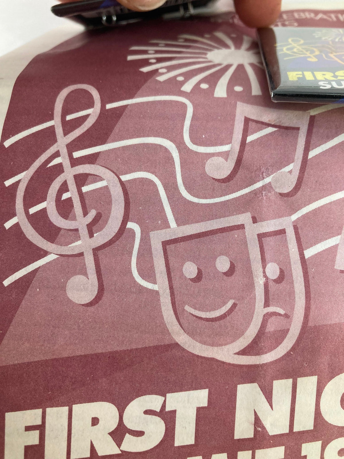 Details from the 1996 Program First Night Summit A Non-Alcoholic Celebration featuring artwork of musical notes and theater masks.