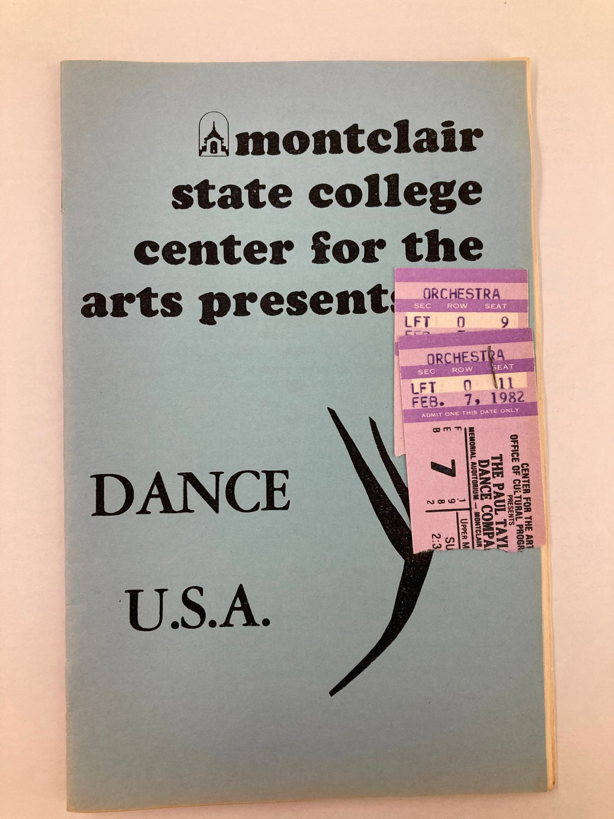 1982 Program Montclair State College Presents Dance U.S.A. featuring a blue cover with text detailing the event.