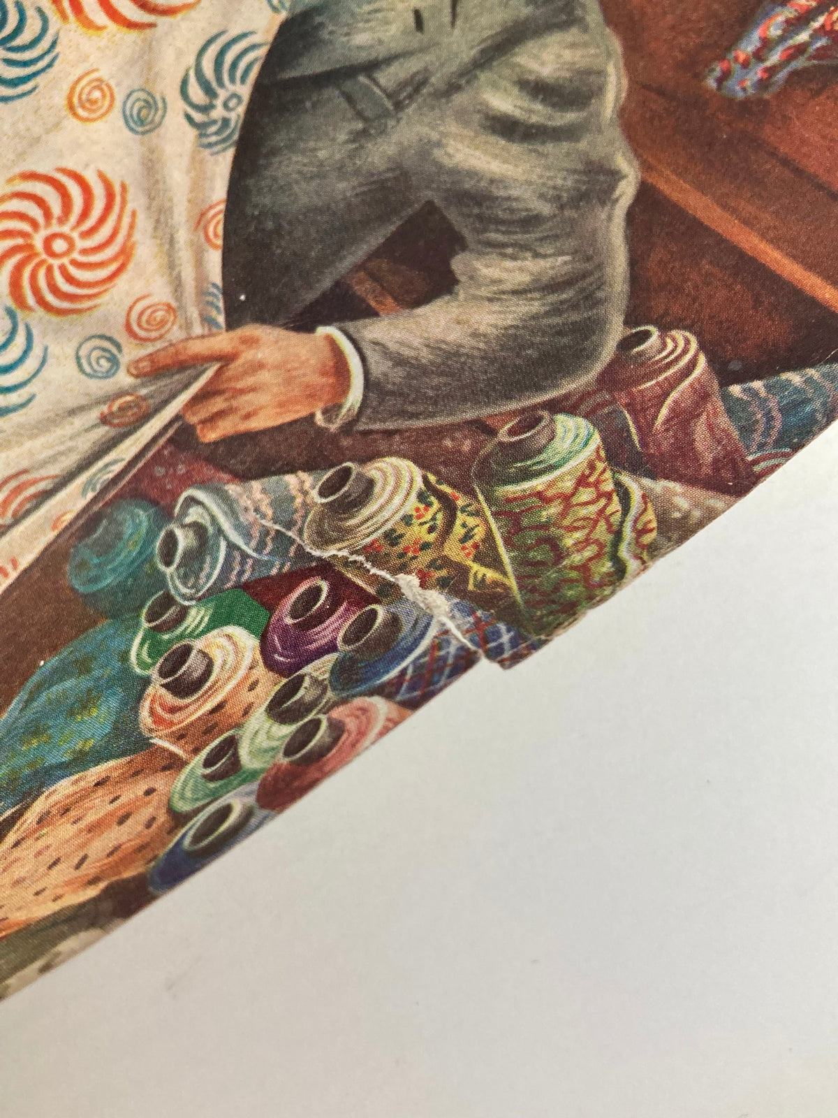 Close-up view of the fabric rolls featured on the cover of The Saturday Evening Post, May 22, 1948, titled 'I Was Baseball's Bad Boy.'