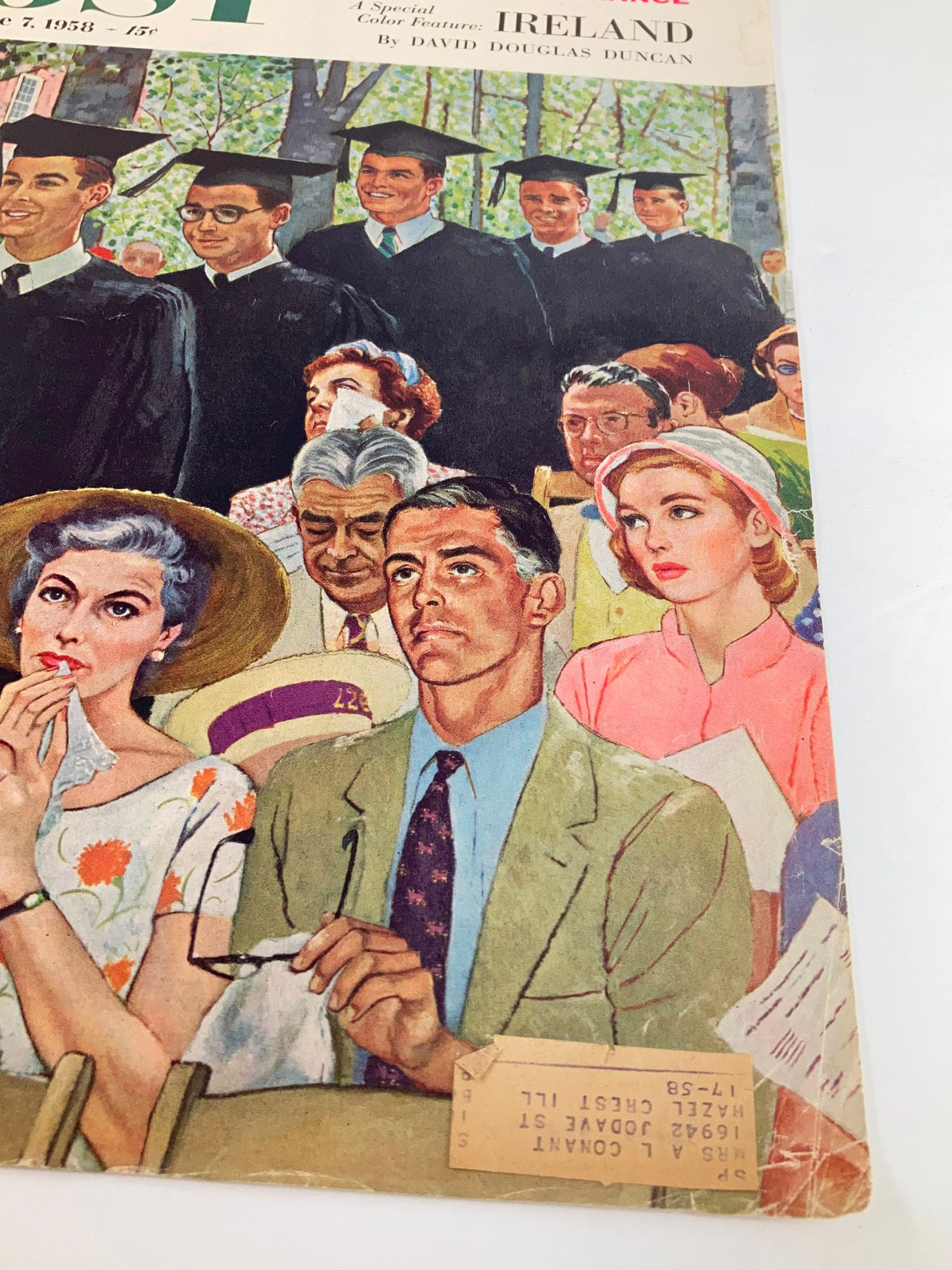 Cover of The Saturday Evening Post June 7, 1958, showing a graduation ceremony with men in caps and gowns, a woman in a floral dress, and an emotional man in a pastel suit, capturing a nostalgic moment.