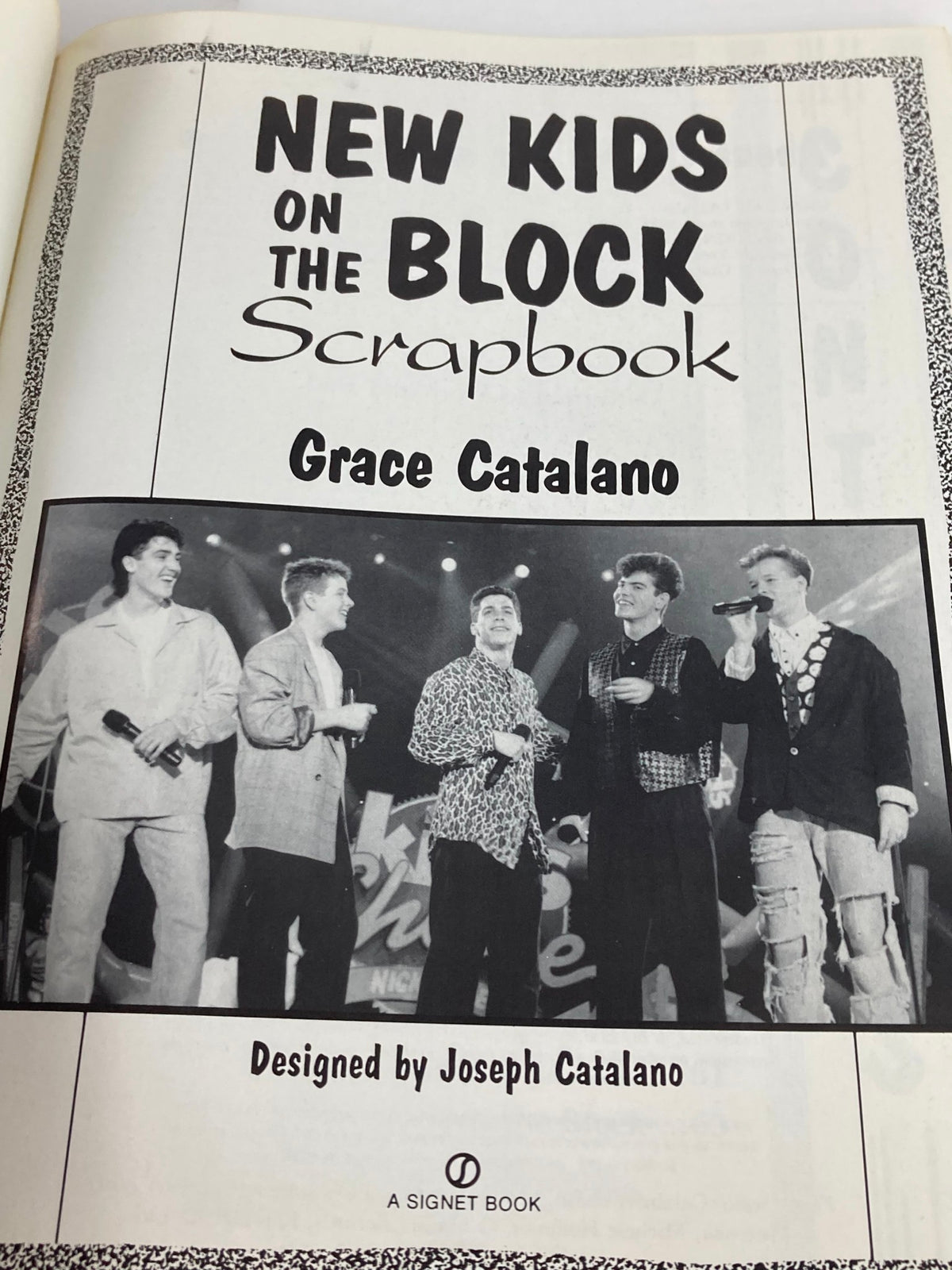 Title page of '1990 New Kids On The Block Scrapbook by Grace Catalano' showcasing the names of the band members.