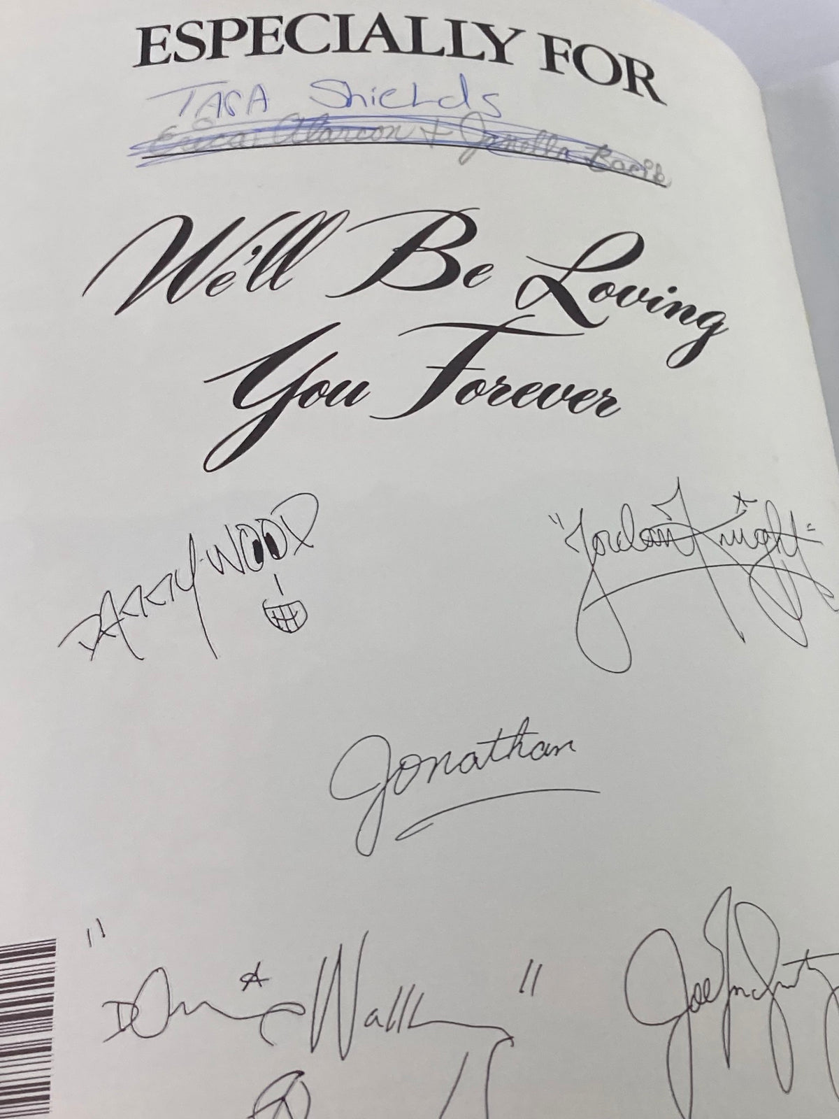 Inside page of 1988 The Official Autobiography Our Story New Kids On The Block showcasing handwritten messages and signatures from band members.