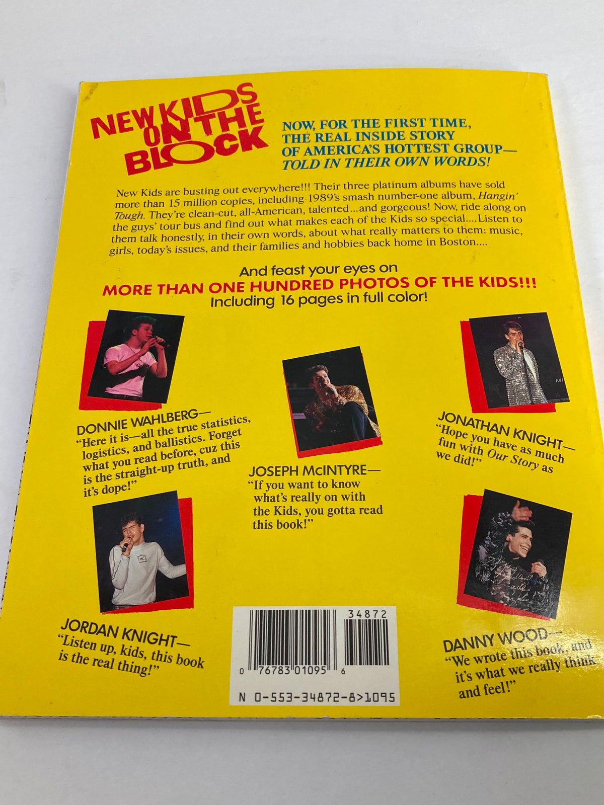 The back cover of '1988 The Official Autobiography Our Story New Kids On The Block', featuring bold text and images of the group, providing insights into their journey and the book's content.