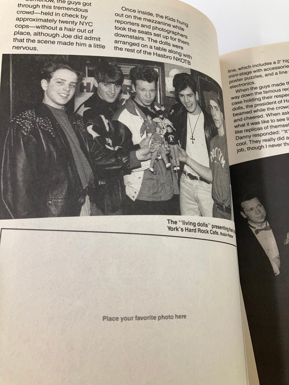 1990 New Kids on The Block Scrapbook by Anne M. Raso featuring a black and white photo of the band members posing with a doll at New York's Hard Rock Cafe.