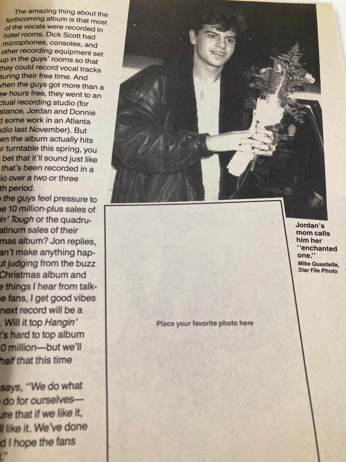 1990 New Kids on The Block Scrapbook by Anne M. Raso showing a candid photo of Jordan Knight holding flowers at a promotional event.