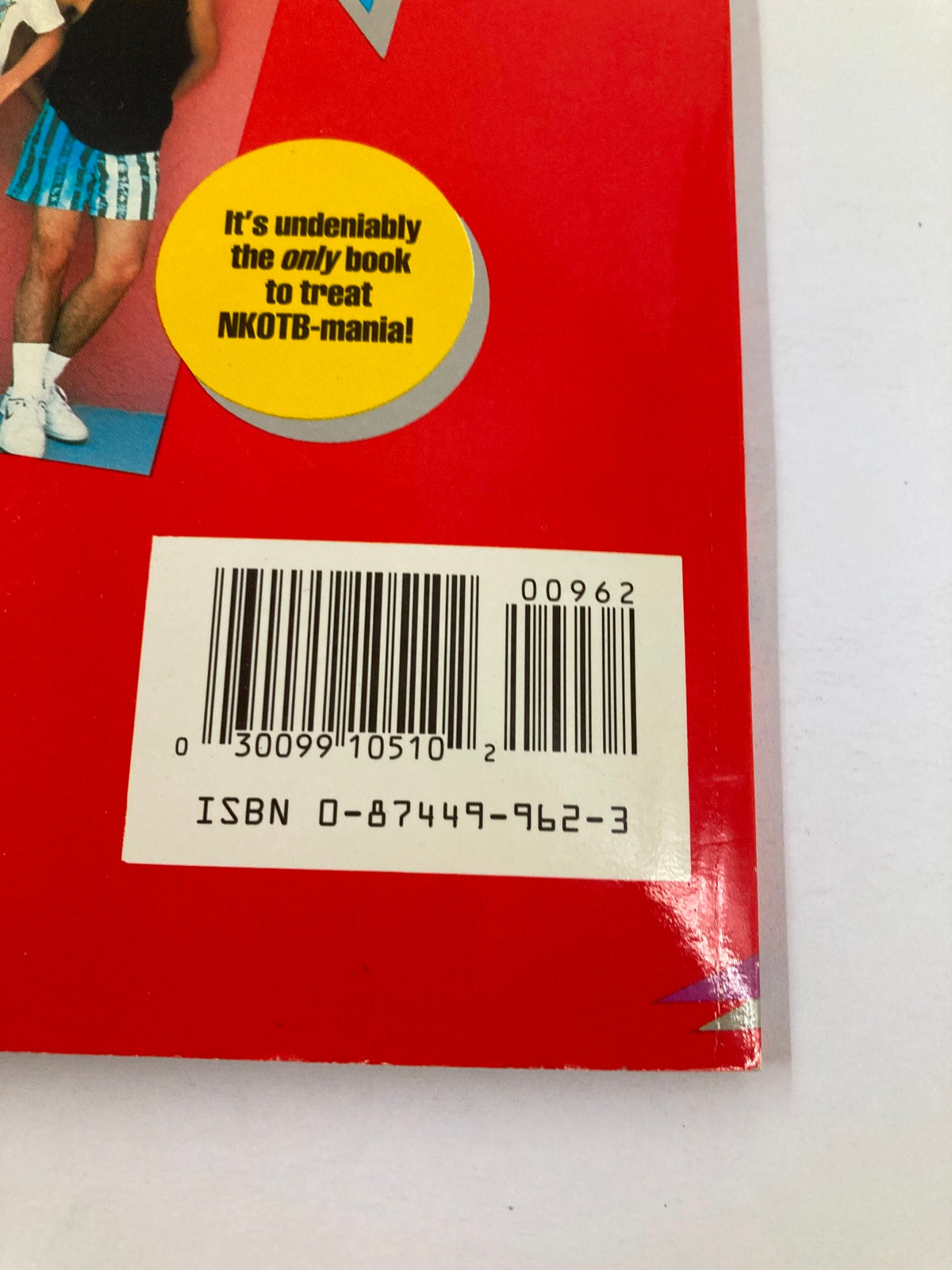 Close-up of the barcode on the back cover of '1990 New Kids on The Block Scrapbook by Anne M. Raso', including ISBN details.