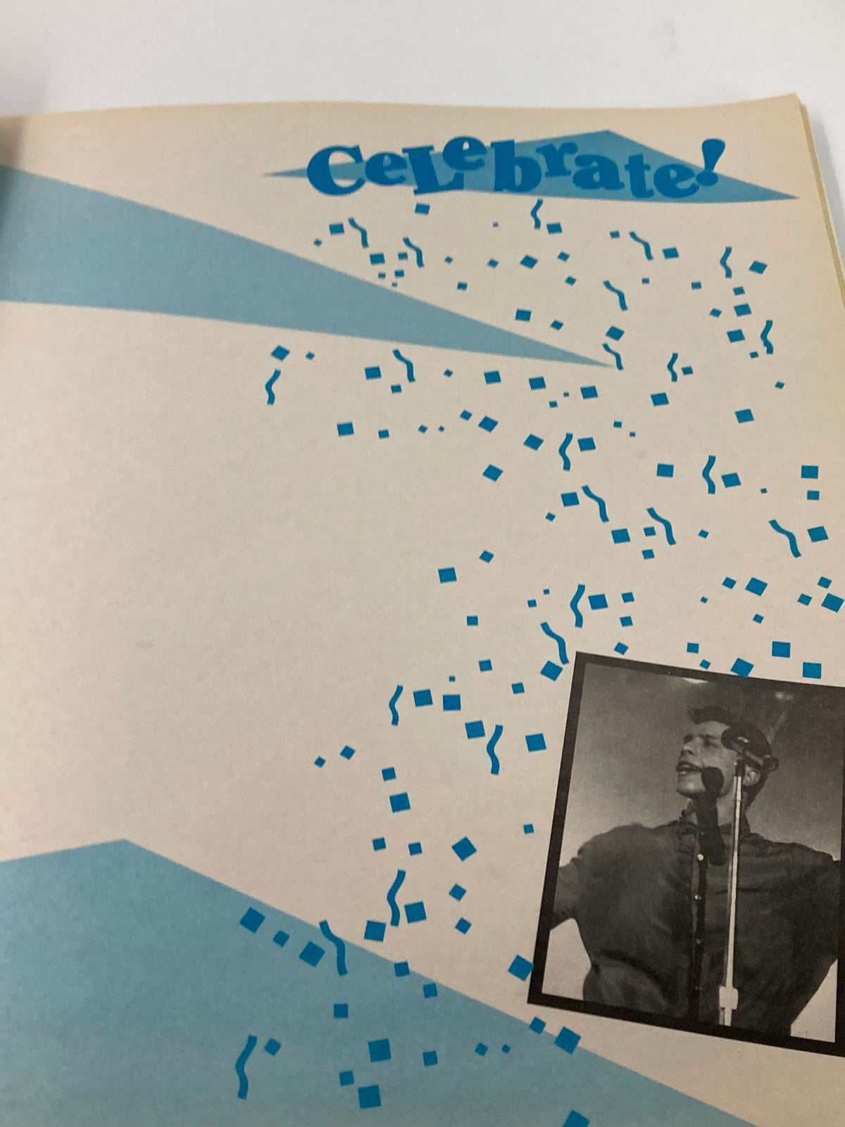 Image from the 1989 Official New Kids on The Block Bonus Scrapbook featuring the word 'Celebrate!' in blue text with confetti design and a black-and-white photo of a performer.