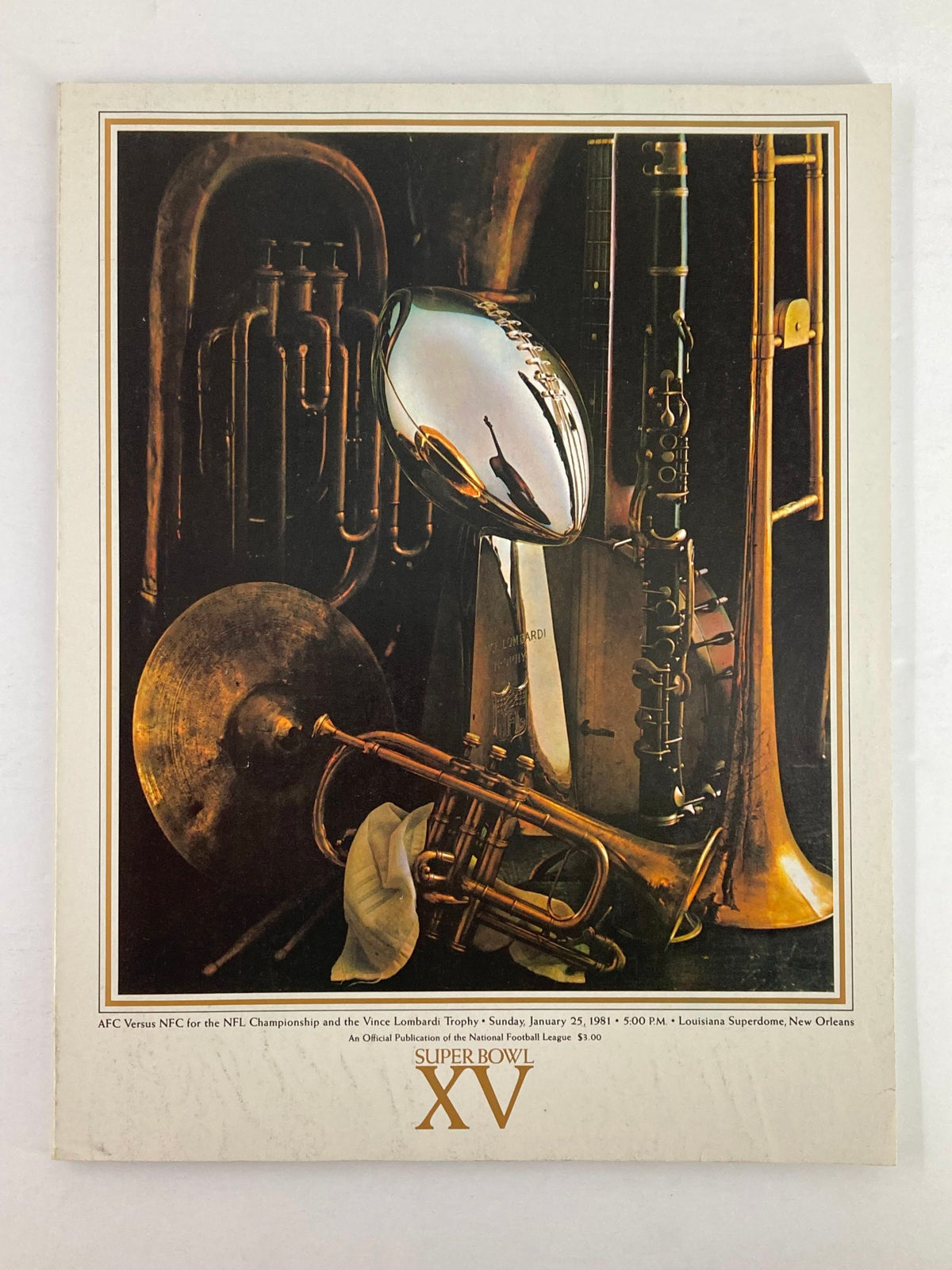 Cover of the 1981 NFL Super Bowl XV Magazine featuring the Vince Lombardi Trophy and musical instruments, showcasing the AFC vs. NFC championship theme.