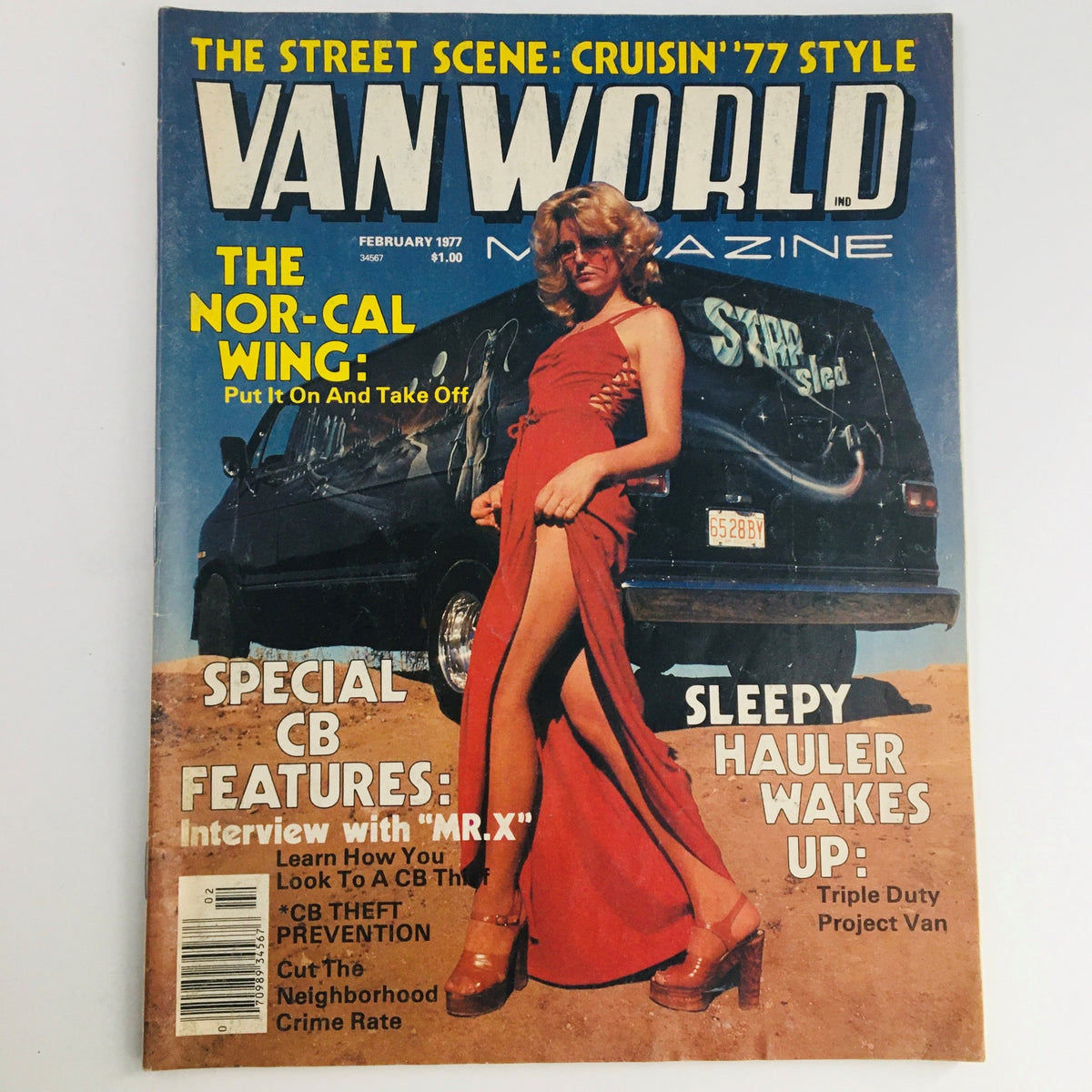 Cover of Van World Magazine February 1977 featuring the Nor-Cal Wing and a model in a red dress with a vintage van in the background. Highlights include van culture, special CB features, and the Triple Duty Project Van.