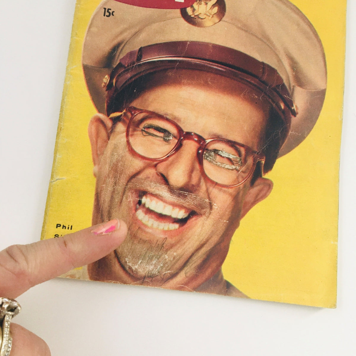 Close-up of TV Guide Magazine October 29 1955 cover, emphasizing Phil Silvers with a bright smile and playful demeanor, along with the magazine's iconic design.