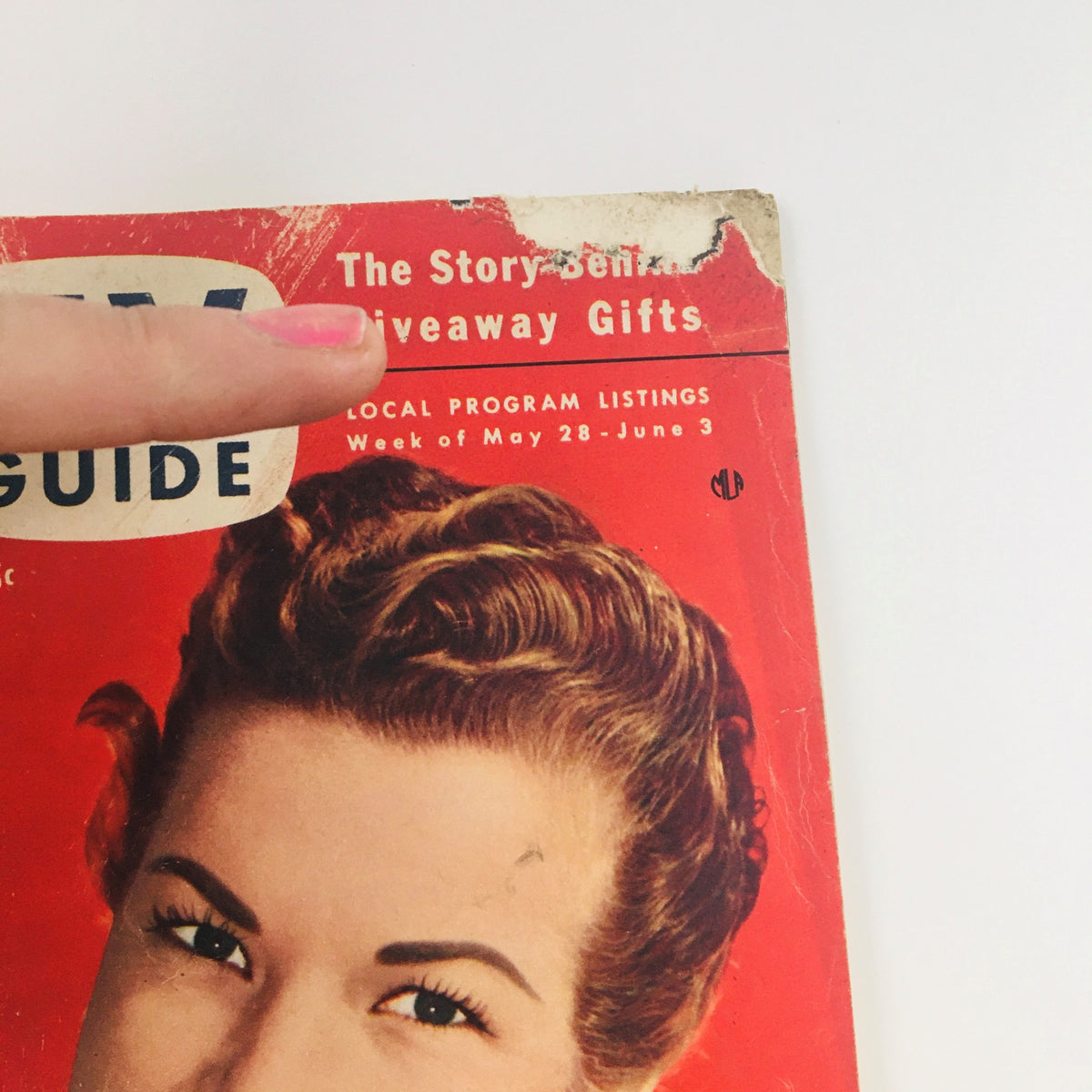 Close-up view of the top portion of TV Guide Magazine May 28 1954 with the title and a feature on Gale Storm, highlighting vintage entertainment history.