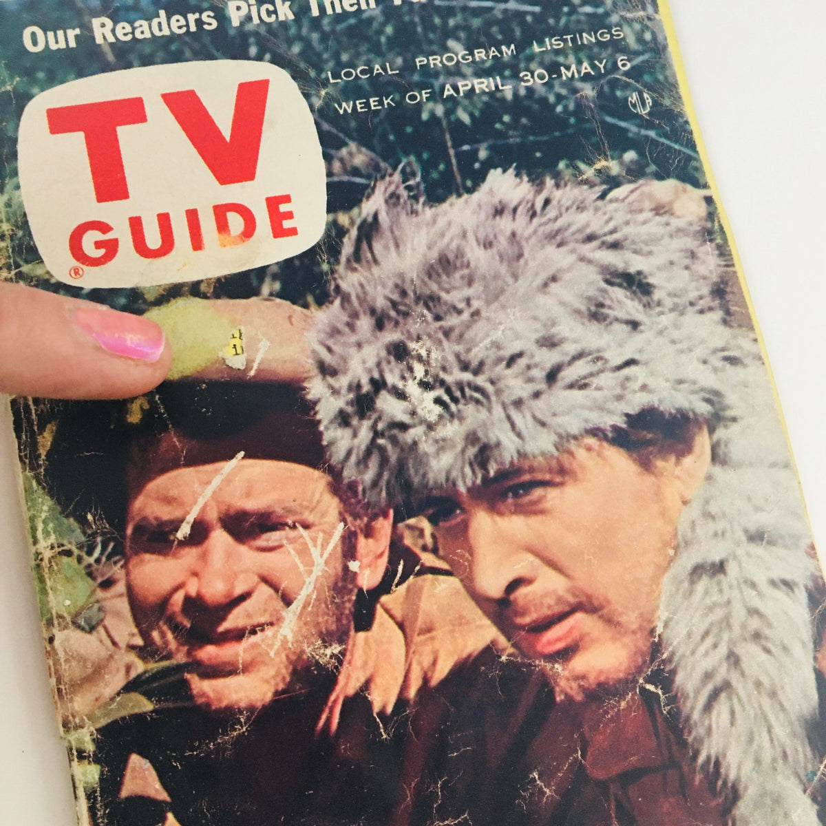 Detailed view of the cover of TV Guide Magazine April 30 1955, highlighting the title and featuring images of Buddy Ebsen and Fess Parker.