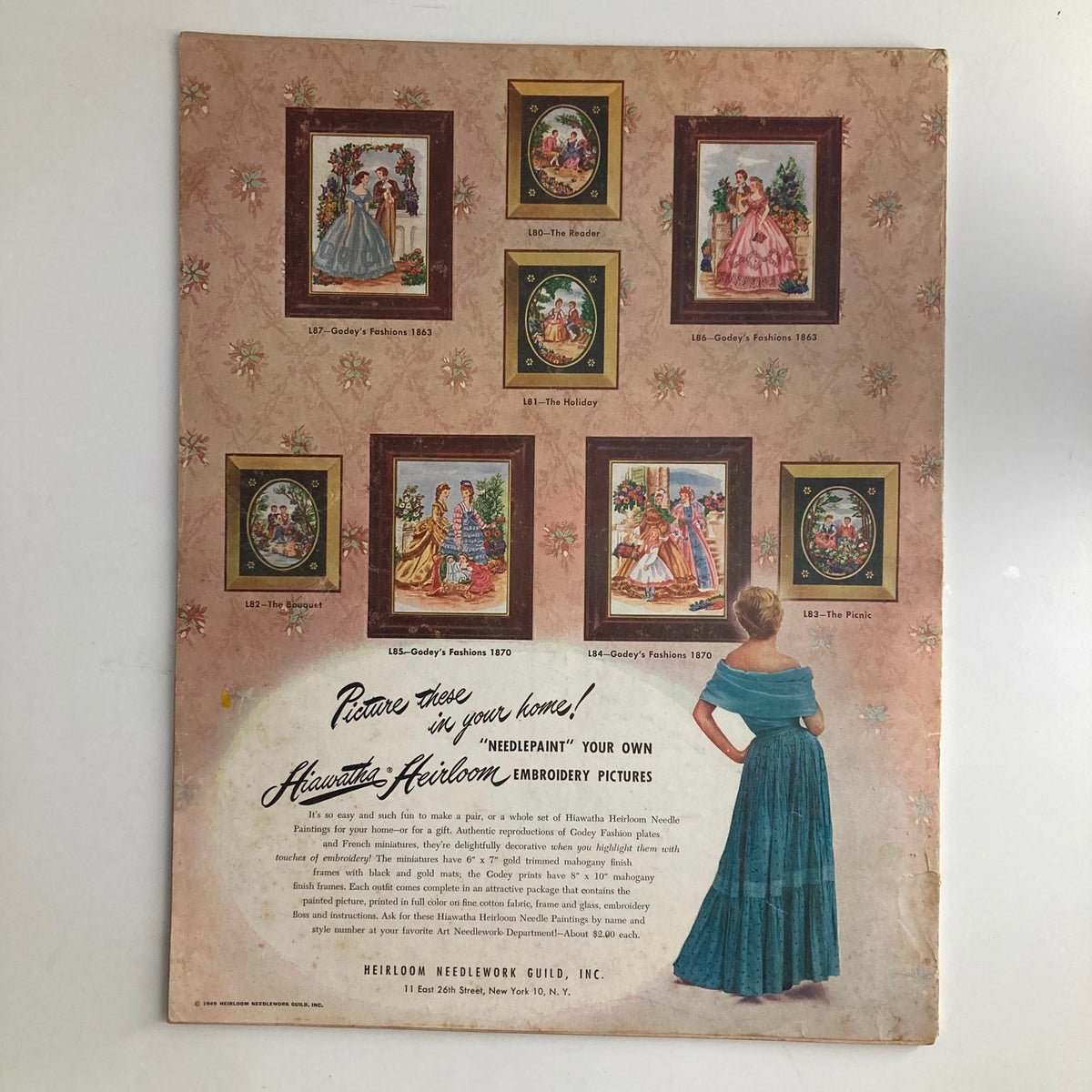 Back cover of the McCall Needlework Magazine Spring Summer 1950, featuring vintage embroidery and needlework patterns along with a model in a stylish blue dress. Ideal for crafting enthusiasts and vintage collectors.