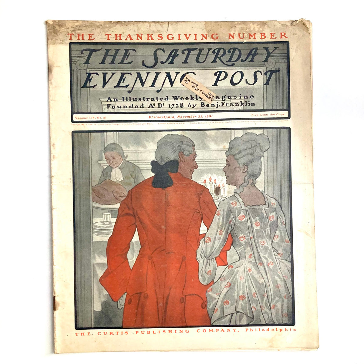 Cover of The Saturday Evening Post Magazine from November 23, 1901, featuring a Thanksgiving theme with a vintage illustration of a couple in period attire.