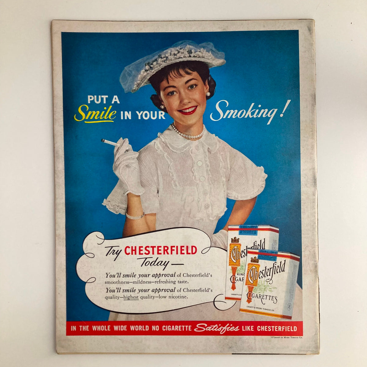 Advertisement page from Look Magazine March 22, 1955, promoting Chesterfield cigarettes, reflecting 1950s advertising style.