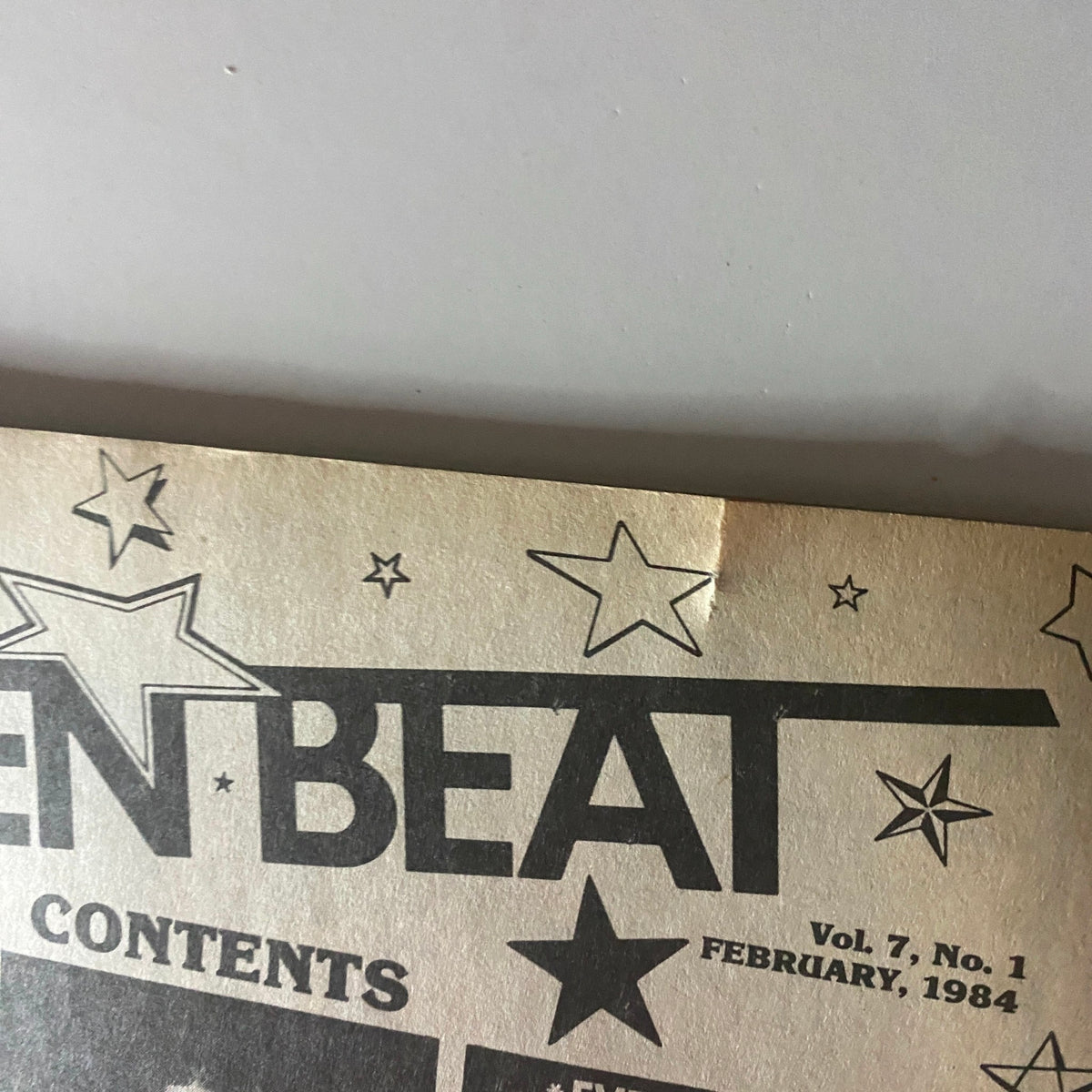 Inside view of Teen Beat Magazine February 1984 showing the contents page with stars and magazine title, indicating the magazine's nostalgic appeal.