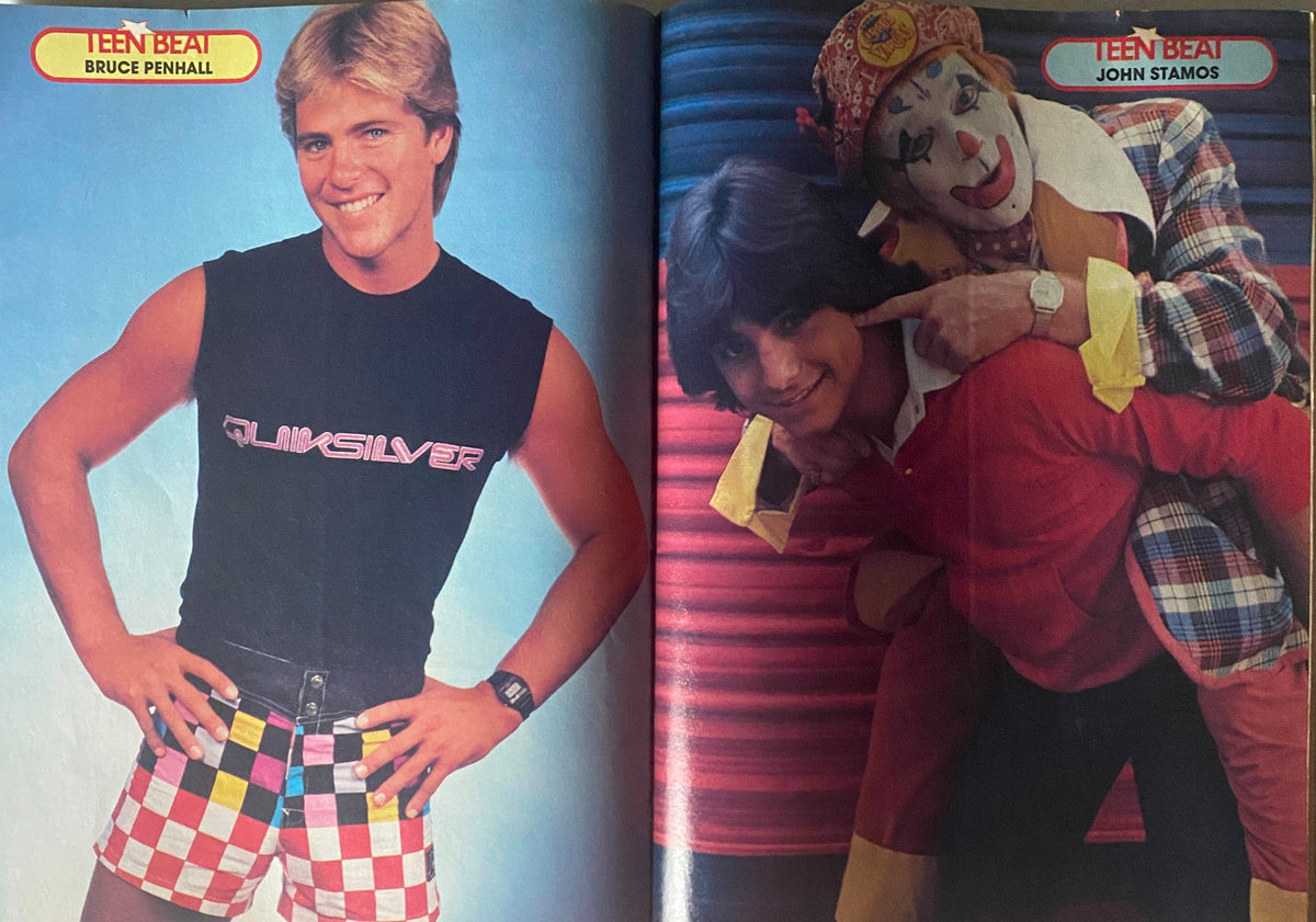 Bruce Penhall and John Stamos featured in Teen Beat Magazine February 1984, displaying vibrant photography of 1980s teen idols.