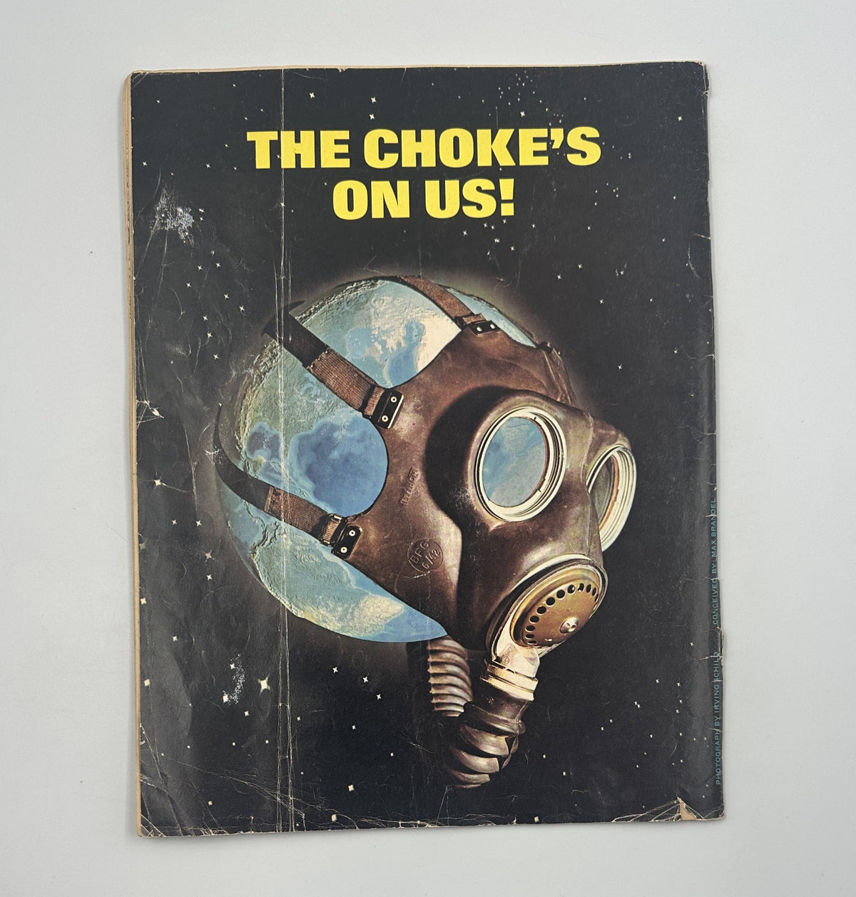 Back cover of MAD Magazine No. 157, March 1973, featuring a striking image of a gas mask over the Earth, with the headline 'THE CHOKE'S ON US!'