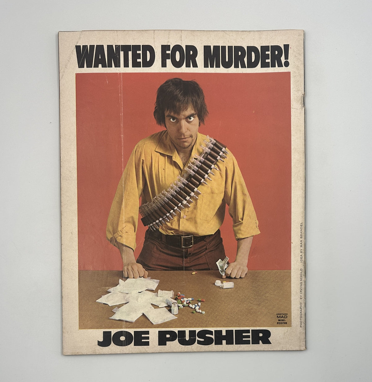 Back cover of MAD Magazine No. 153, September 1972, featuring a parody image with the text 'Wanted for Murder! Joe Pusher'. This promotional art reflects the magazine's unique comedic style.