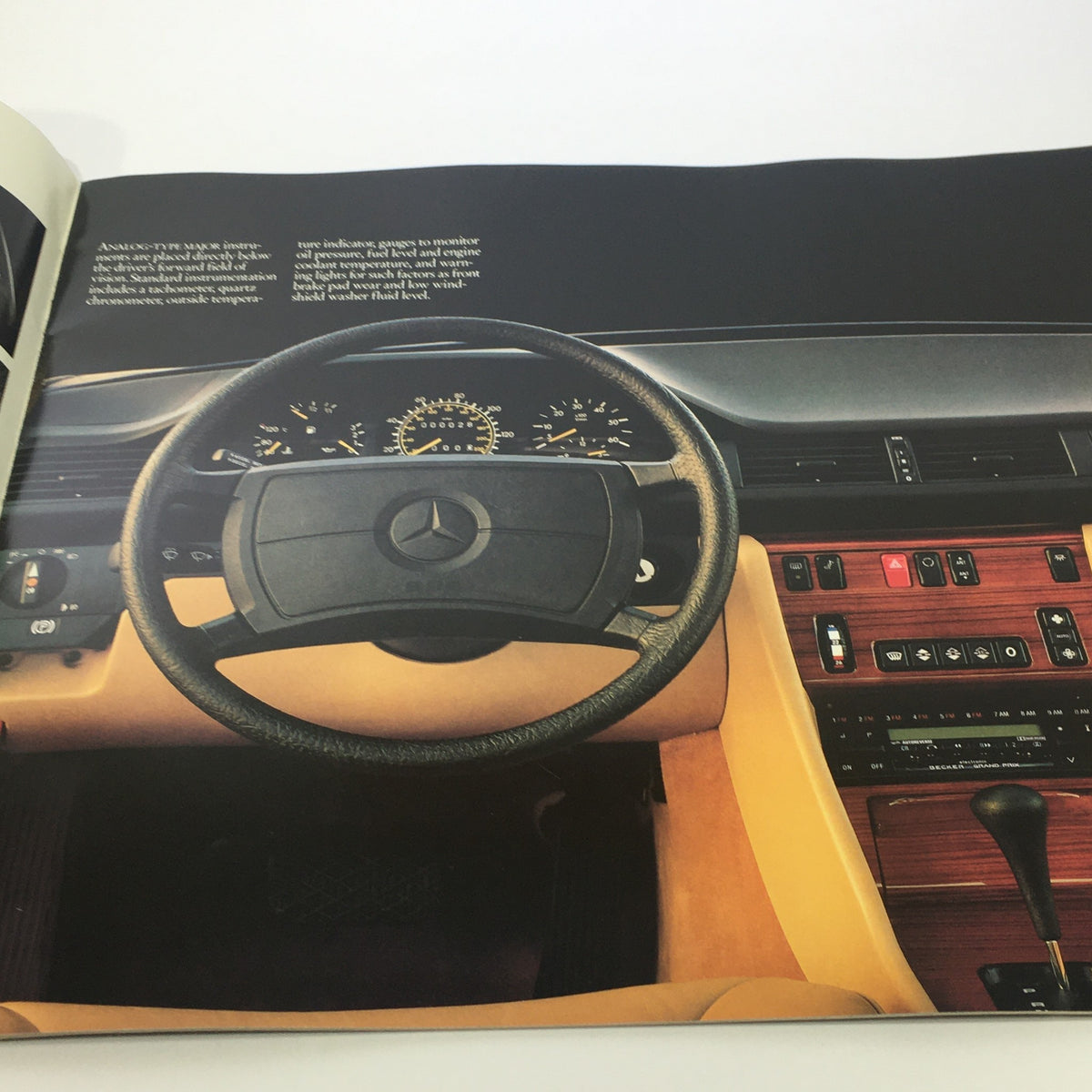 Interior view of the 1986 Mercedes-Benz 300 Class w/Logo Seal Dealership Car Auto Brochure Catalog highlighting the dashboard and controls.