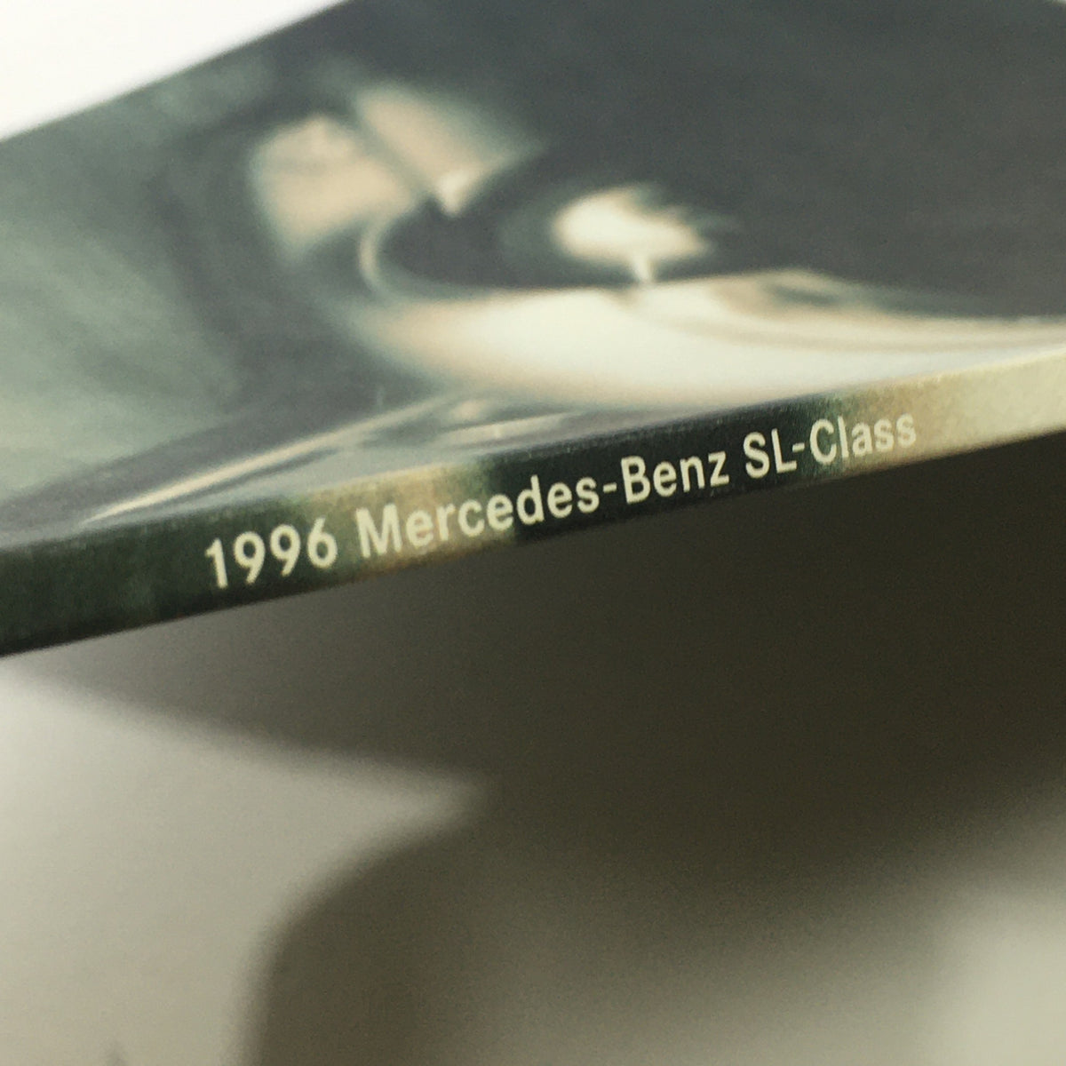 Close-up of the edge of the 1996 Mercedes-Benz Dreams SL-Class Dealership Car Auto Brochure Catalog, showcasing the title printing.
