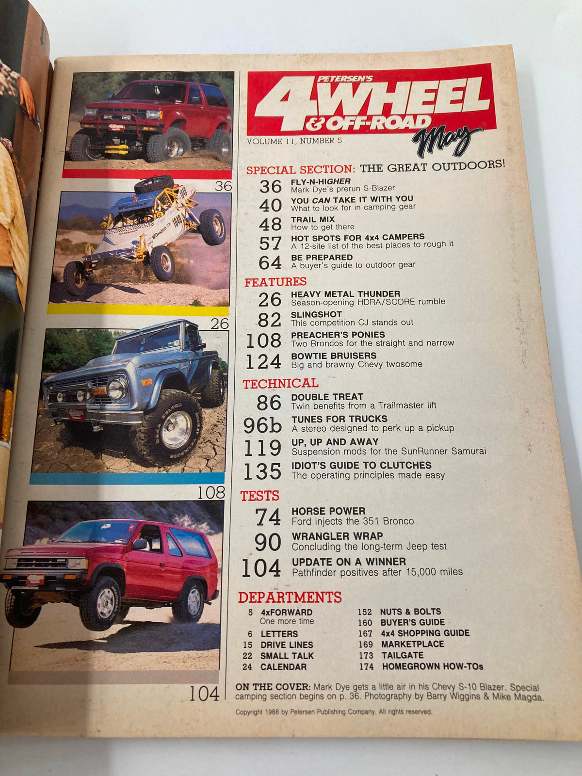 Petersen's 4 Wheel & Off-Road Magazine May 1988 interior page showcasing featured off-road vehicles and articles related to off-road adventures. This page includes listings of special sections, features, and departments relevant to the 4x4 community and off-road camping sites highlighted in the magazine.