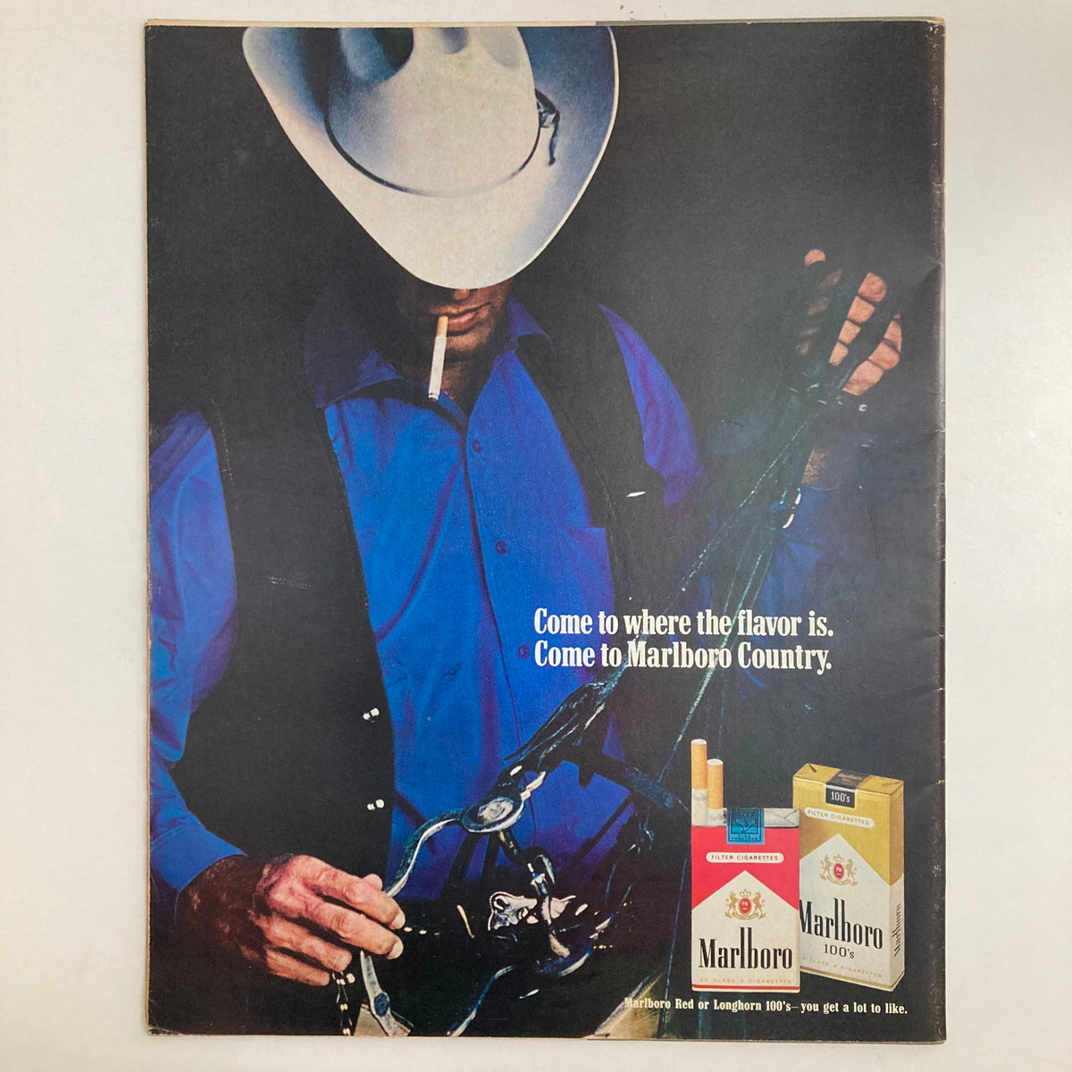 Advertisement from VTG Life Magazine January 23 1970 showcasing Marlboro cigarettes with a cowboy figure highlighting classic American advertising.