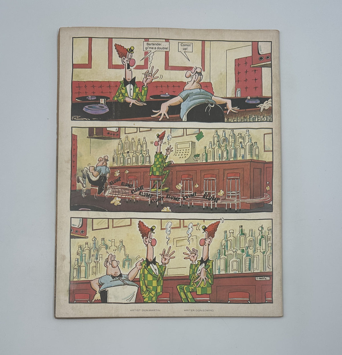 Comic strip from MAD Magazine No. 206 April 1979, showcasing a humorous scene in a bar setting with clowns. This image is part of the issue's content, reflecting the magazine's signature satire and comedy style.