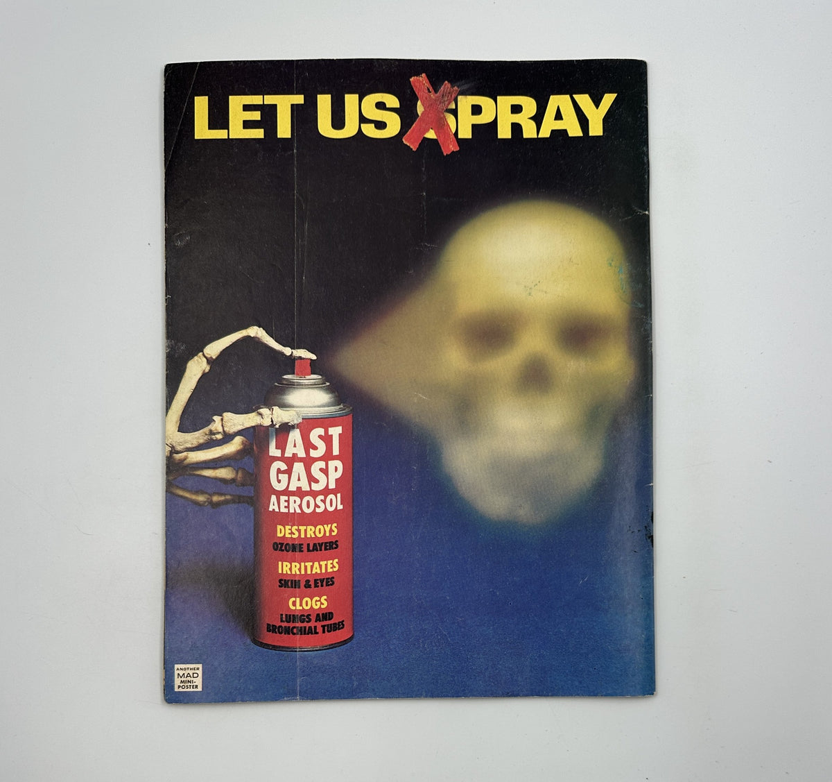 Back cover of MAD Magazine No. 186 October 1976, featuring a humorous advertisement with a skeleton and product titled 'Last Gasp Aerosol'.