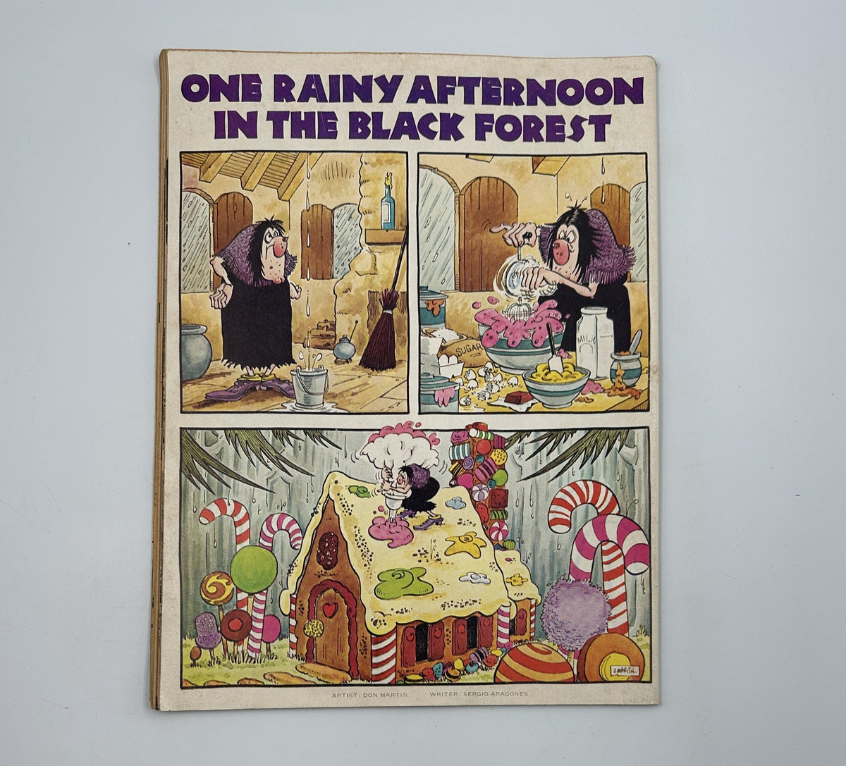 Cover of MAD Magazine No. 204 January 1979 featuring a comic panel titled 'One Rainy Afternoon in the Black Forest', showcasing whimsical characters in a colorful setting with candy elements and cartoonish illustrations.