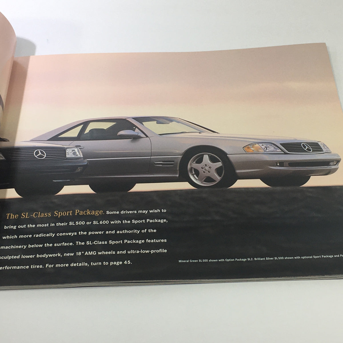 Interior image from the 1999 Mercedes-Benz SL-Class Sport Package catalog, highlighting the SL-Class Sport Package features.