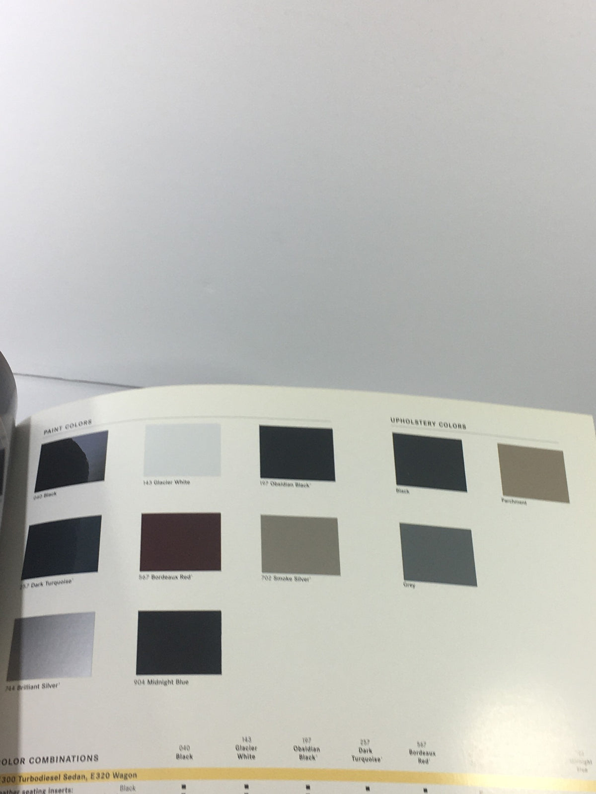 1999 Mercedes-Benz E-Class Dealership Car Auto Brochure Catalog showcasing a color palette section with various paint and upholstery options.