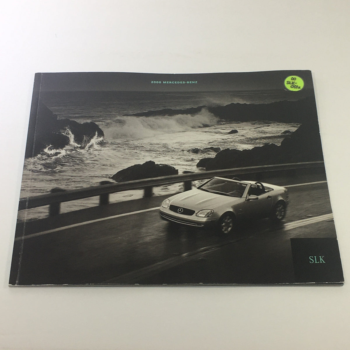 2000 Mercedes-Benz SLK Designo Editions Dealership Car Auto Brochure Catalog showcasing the exterior of the vehicle on a coastal road.