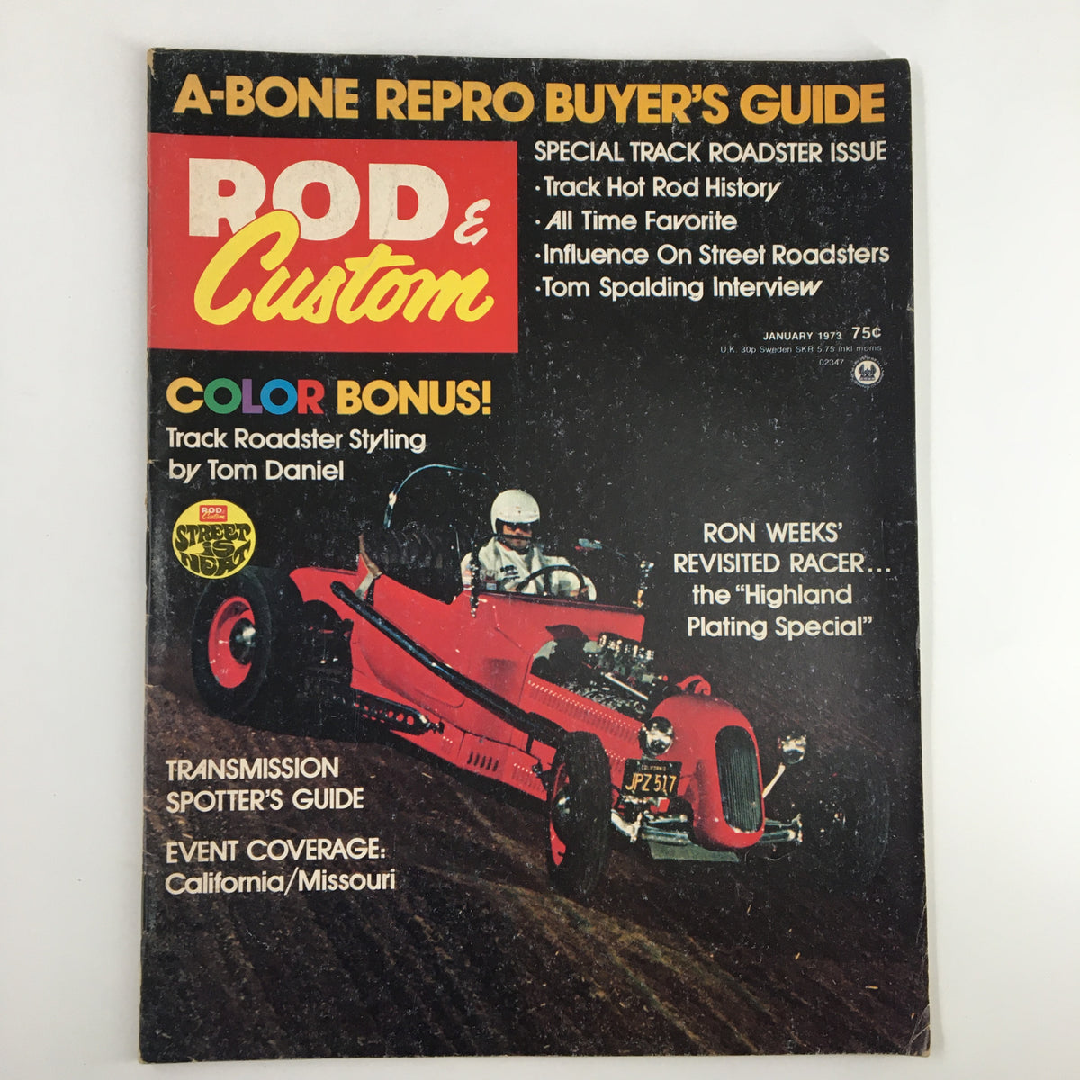 VTG Rod & Custom Magazine January 1973 featuring a vibrant cover showcasing a red track roadster with a driver wearing a helmet. The cover highlights topics like Track Hot Rod History and includes a Color Bonus.