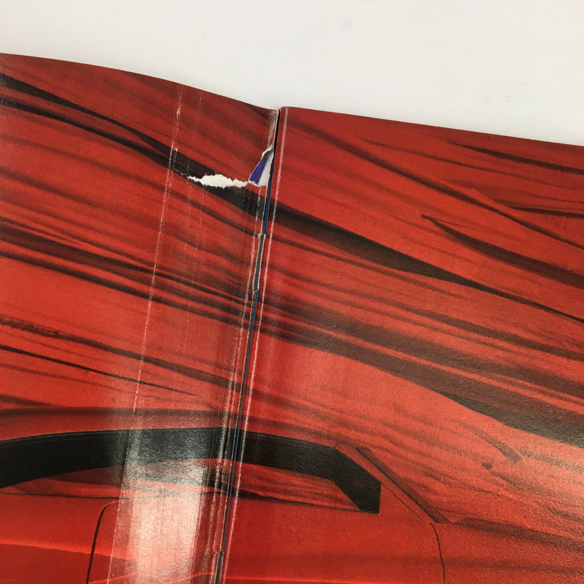 Image of the spine of Rod & Custom Magazine June 1994, showing wear and tear reflecting its vintage condition.