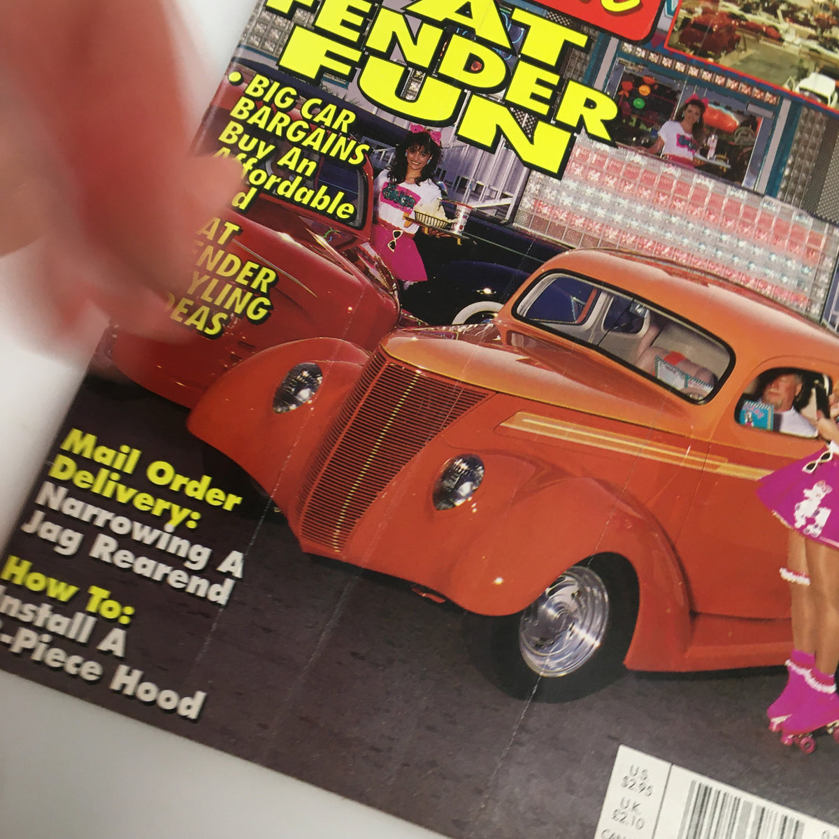 Close-up view of the Rod & Custom Magazine August 1994 cover highlighting the 'Narrowing A Jag Rearend' article and other features related to classic car modifications.