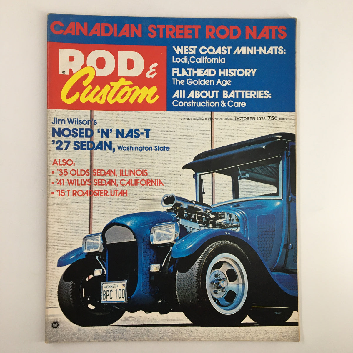 Cover of VTG Rod & Custom Magazine October 1973 featuring Jim Wilson's iconic 'Nosed 'N NAS-T '27 Sedan, showcasing vintage automotive style and culture.