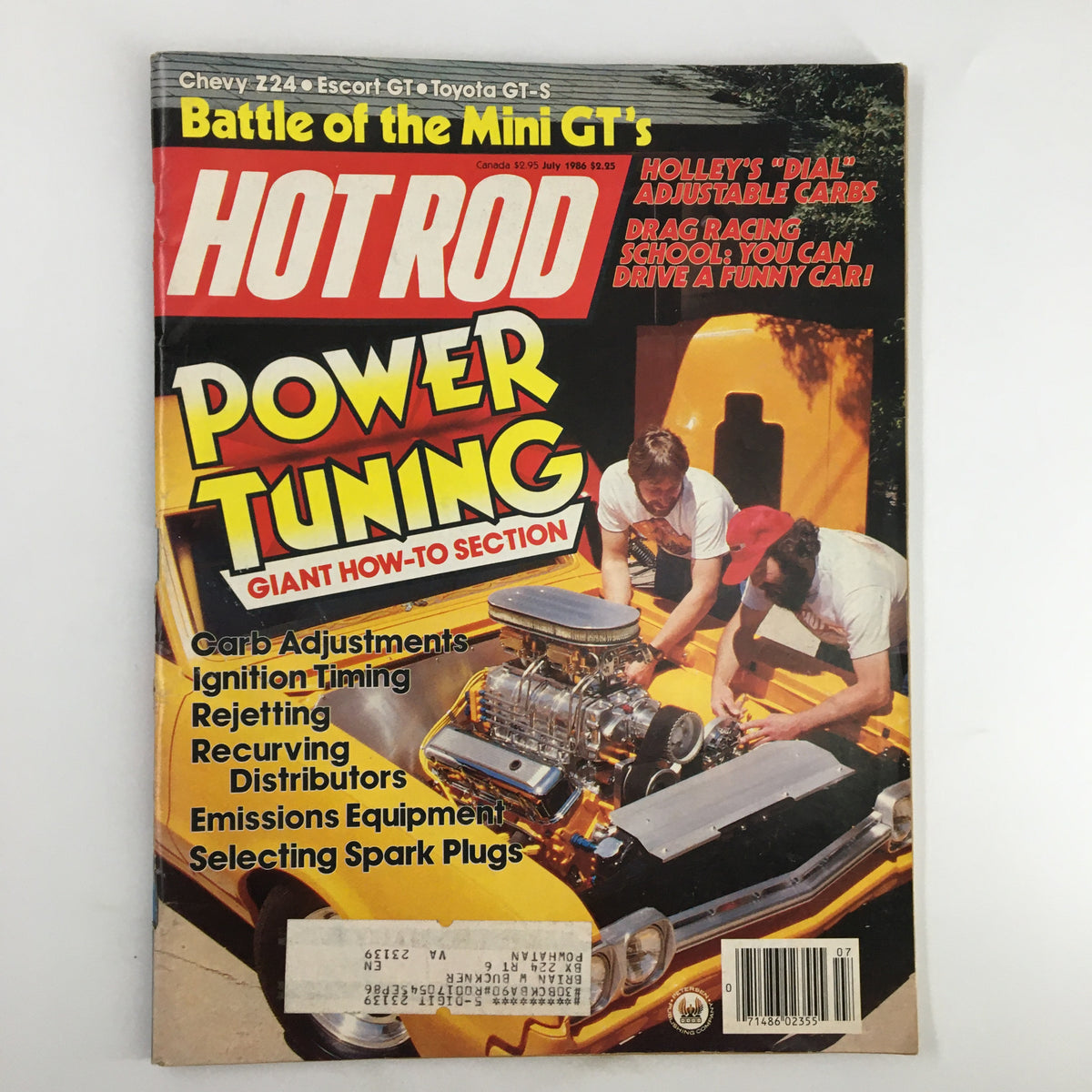 Cover of VTG Hot Rod Magazine July 1986 featuring the title 'Power Tuning Giant How-To Section', highlighting topics like carb adjustments and ignition timing, with an image of automotive enthusiasts working on a vehicle.